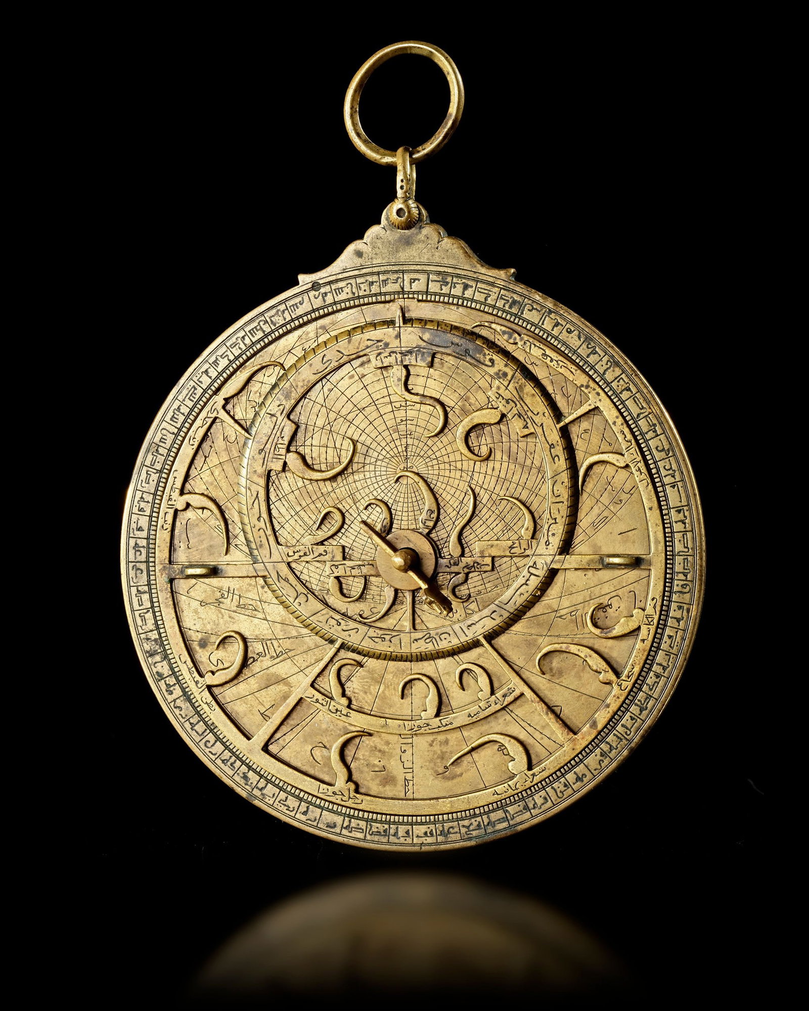A BRASS ASTROLABE SIGNED BY MUá¸¤AMMAD IBN FATT??á¸¤ AL-KHAMÄ€â€™IRÄ?, SEVILLE (1 of 10)
