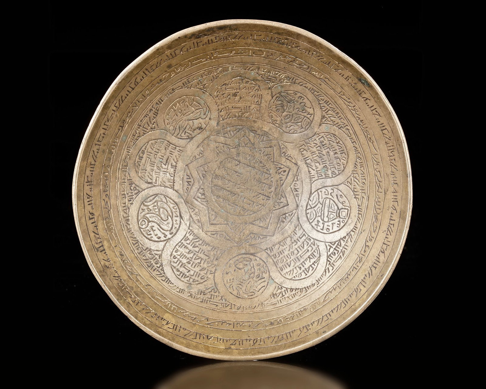A BRONZE MAGIC BOWL, 13THâ€“14TH CENTURY (1 of 4)