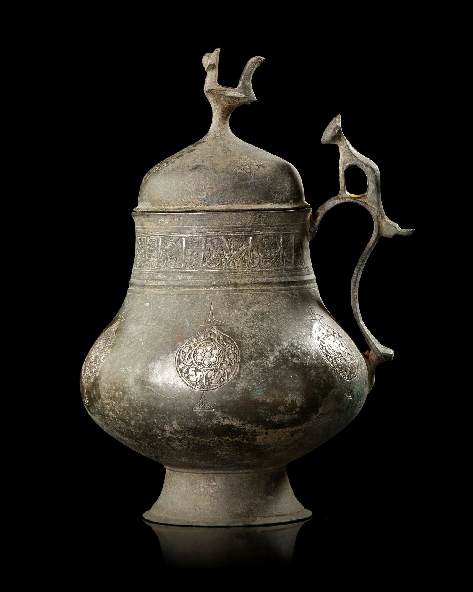 A KHORASSAN SILVER INLAID COVERED JUG NORTH EAST PERSIA, 12TH CENTURY (1 of 4)