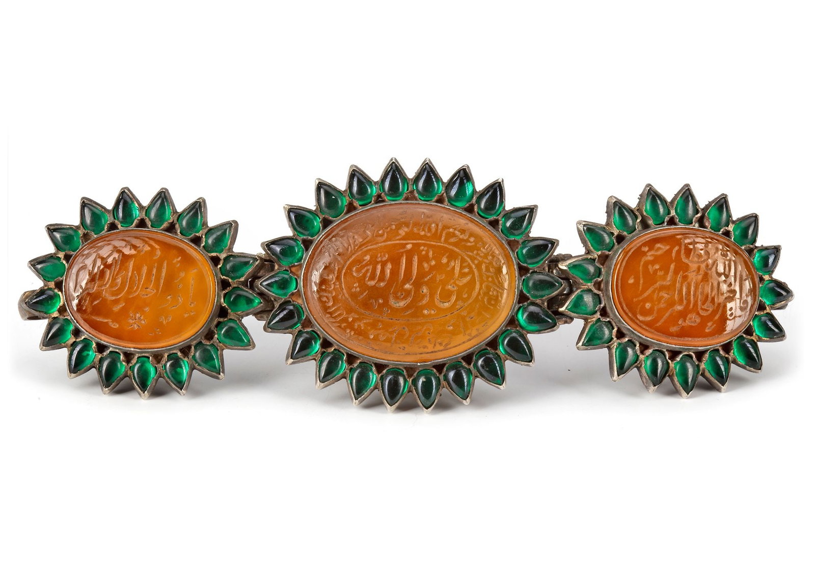A MUGHAL TALISMANIC BAZUBAND, INDIA, 19TH CENTURY: Comprising three rounded panels of agate stones, each engraved with lines of Naskh or Nasta'liq script, set in a hinged silver mount with cusped edges and backs, boldly engraved with flowers and furth