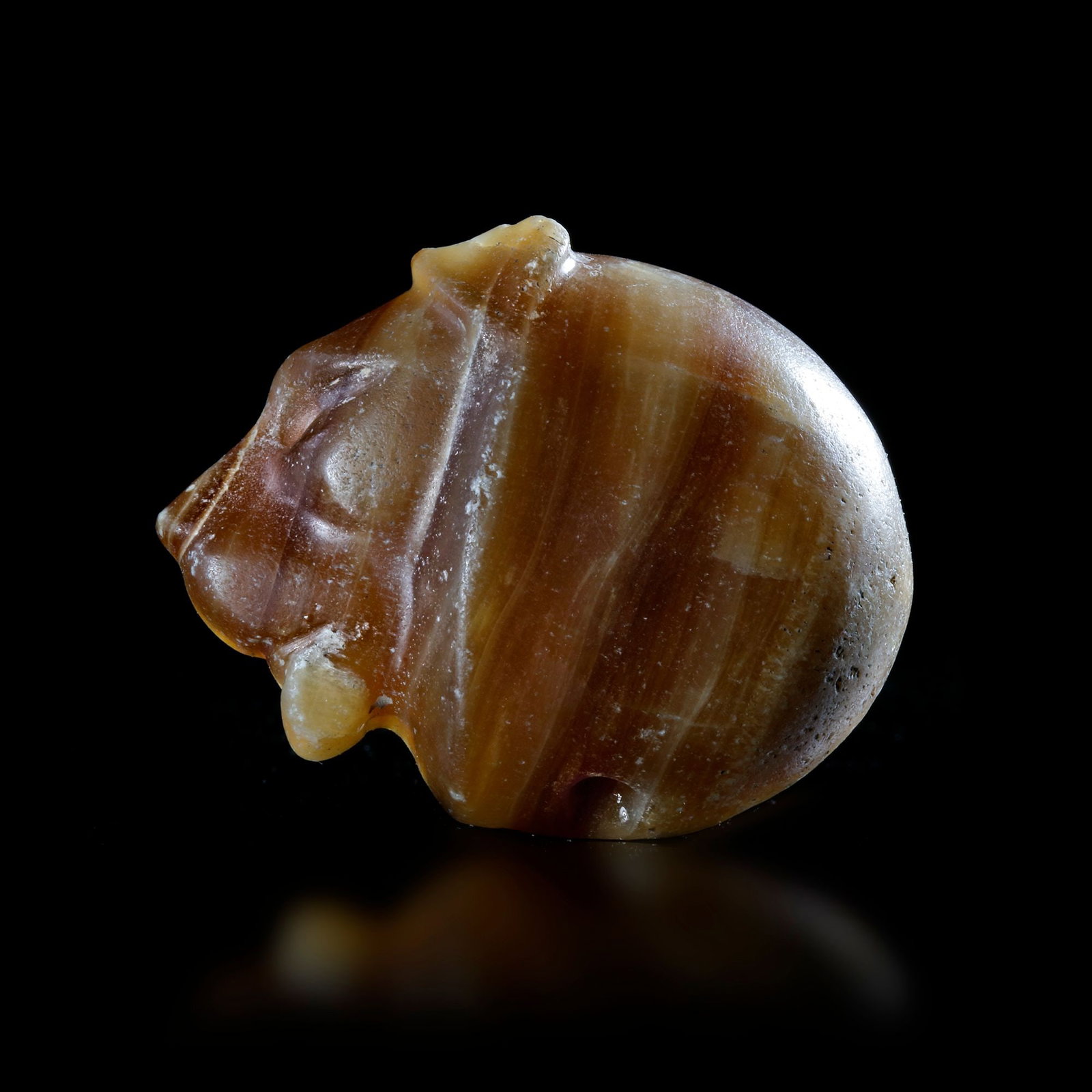 A BEAUTIFUL STAMP SEAL IN THE FORM OF A LION'S HEAD, 3RD MILLENNIUM BC (1 of 4)