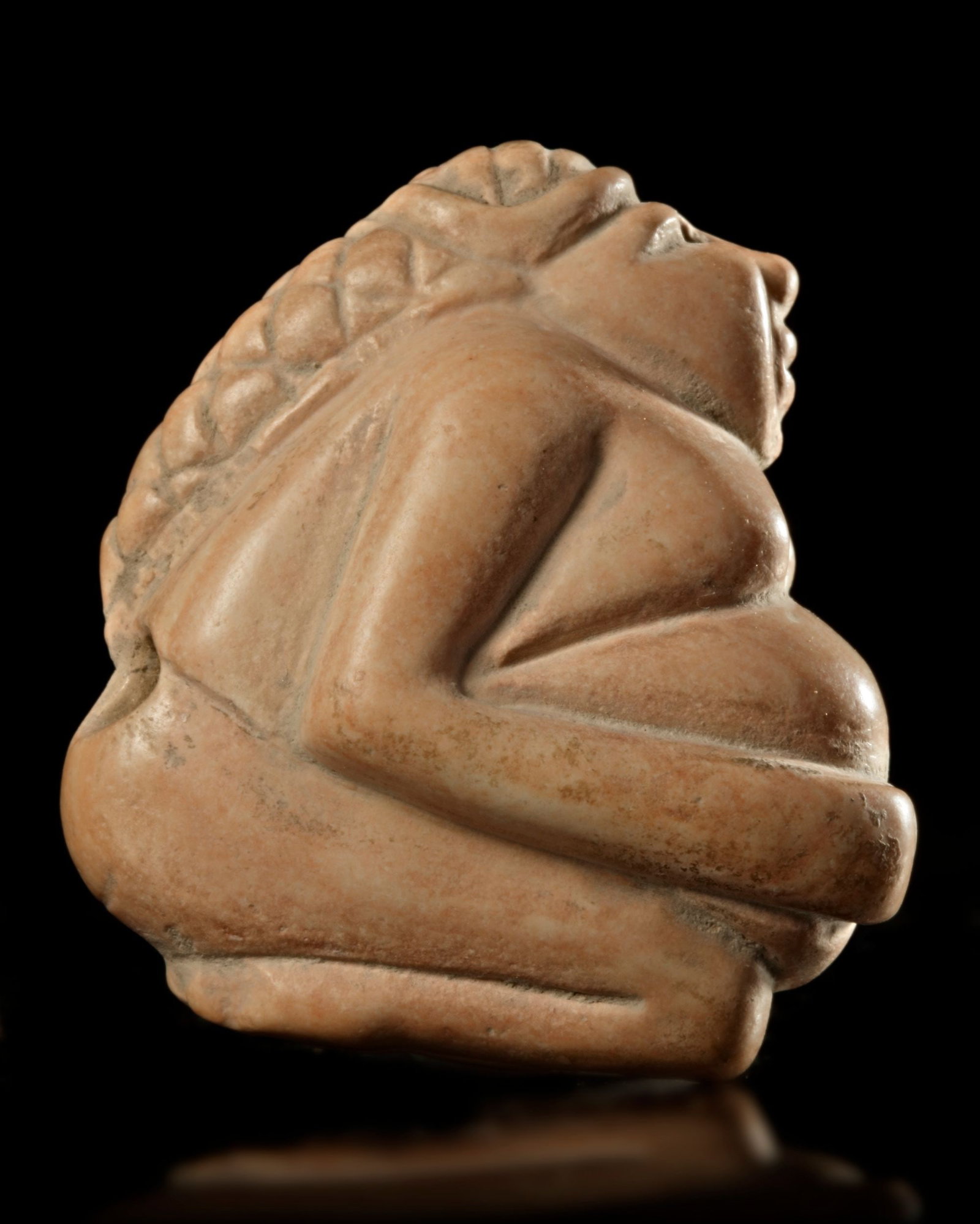 A NEAR EASTERN SEAL OF A SEATED WOMAN, 3RD MILLENNIUM BC (1 of 3)