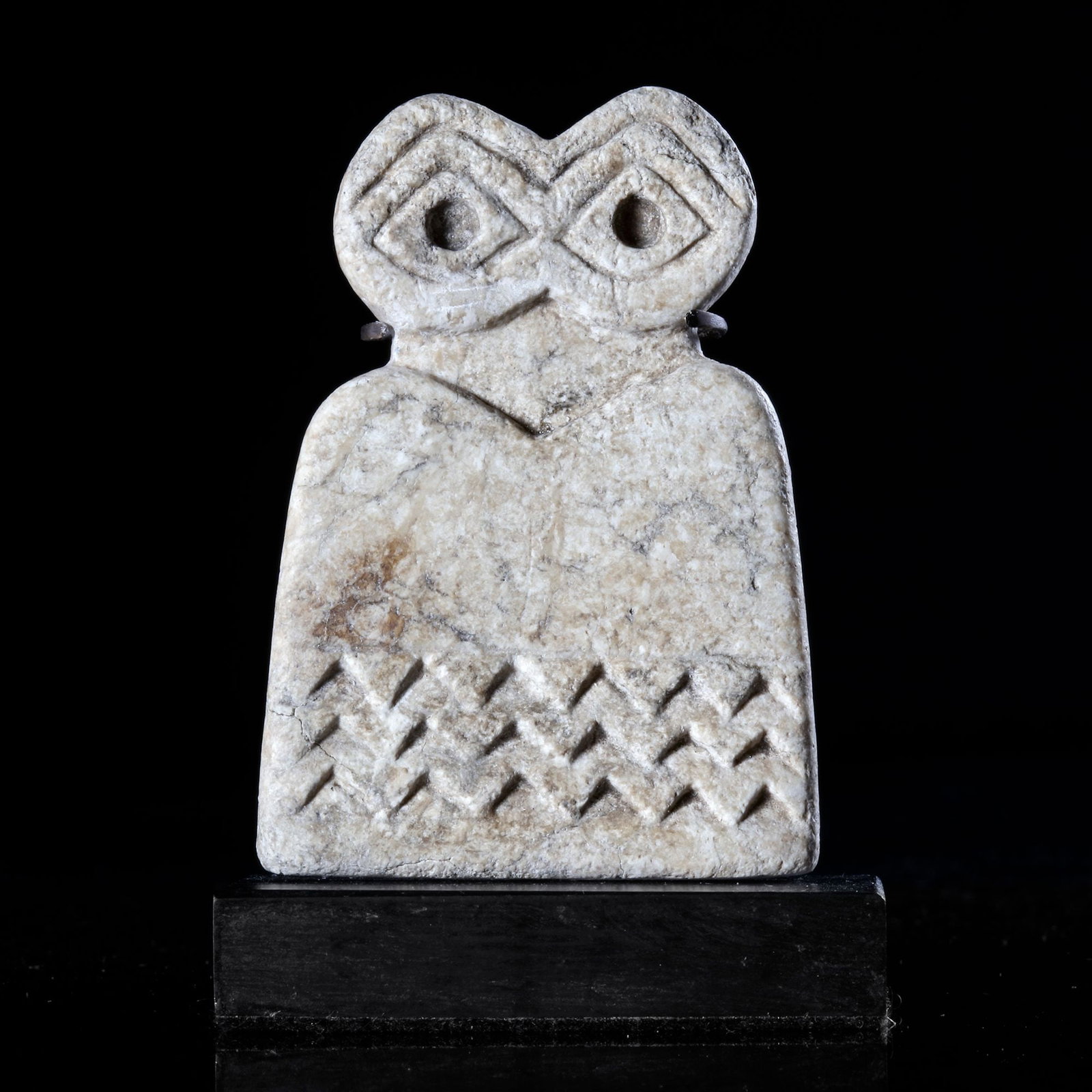 AN EYE IDOL MADE OF CALCITE, NEAR EASTERN, 3RD MILLENNIUM BC (1 of 3)
