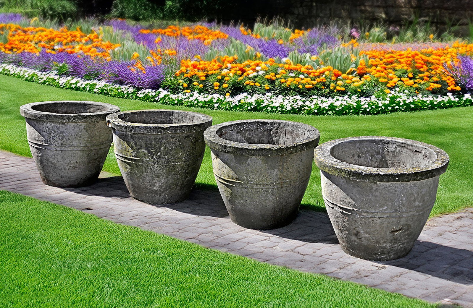 A SET OF FOUR COMPOSITION STONE GARDEN PLANTERS, SECOND HALF 20TH CENTURY (1 of 1)