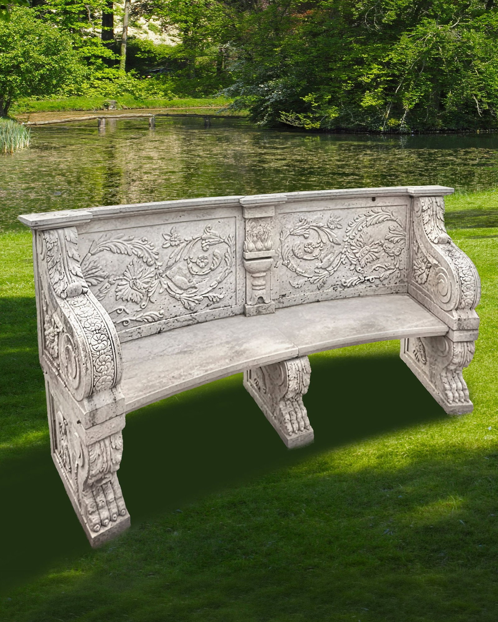 A SCULPTED MARBLE GARDEN BENCH: This richly decorated marble garden bench is made of light-colored marble and has a semicircular seat. The backrest consists of several panels with finely detailed reliefs of graceful leaves, flowers,