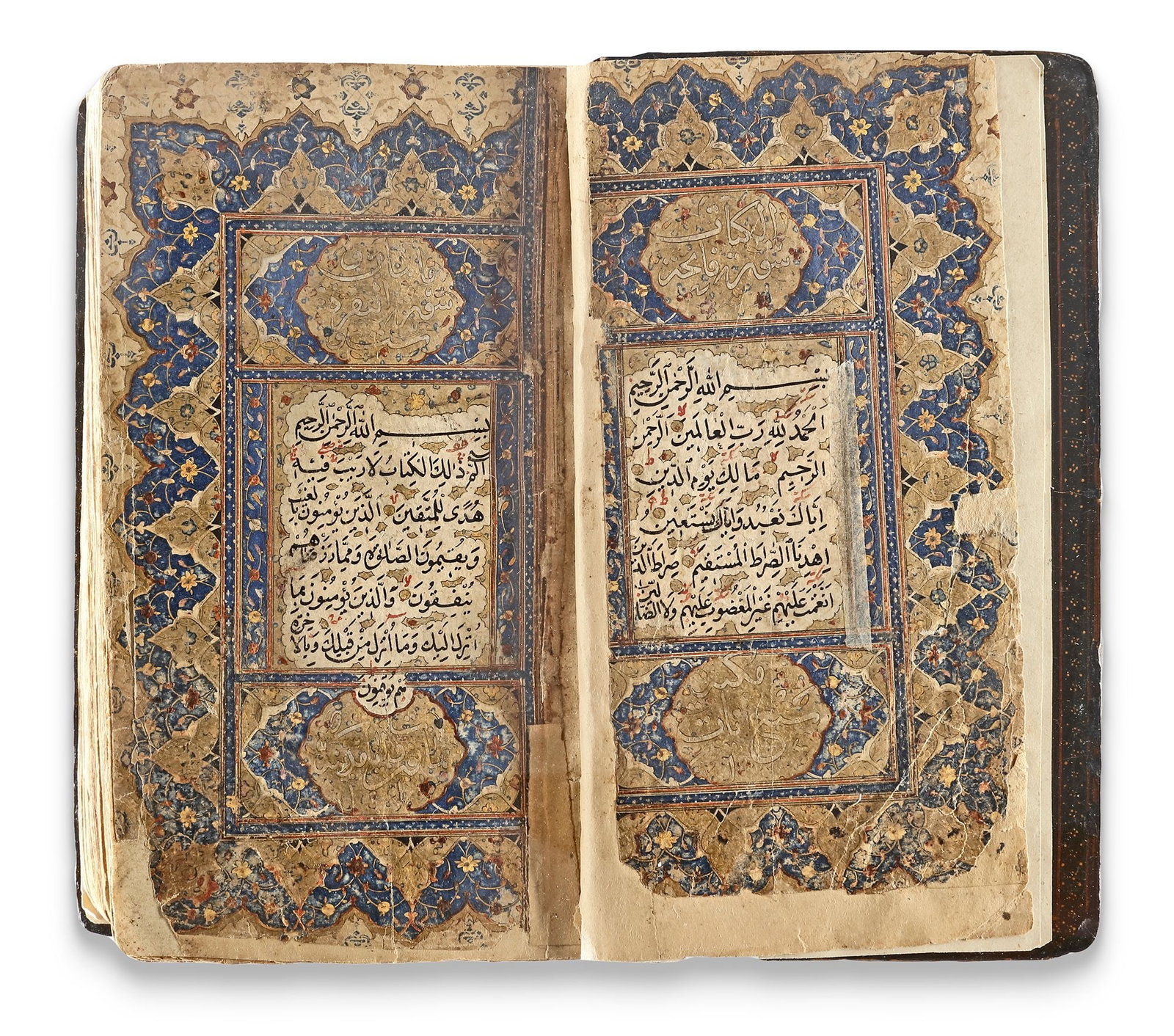 AN ILLUMINATED SAFAVID QURAN, PERSIA SAFAVID, EARLY 16TH CENTURY: Arabic manuscript on paper, each folio featuring 14 lines of elegant black naskh script with diacritics and vowel markings in red. Verses are marked by gold roundels outlined in black. Each page inclu