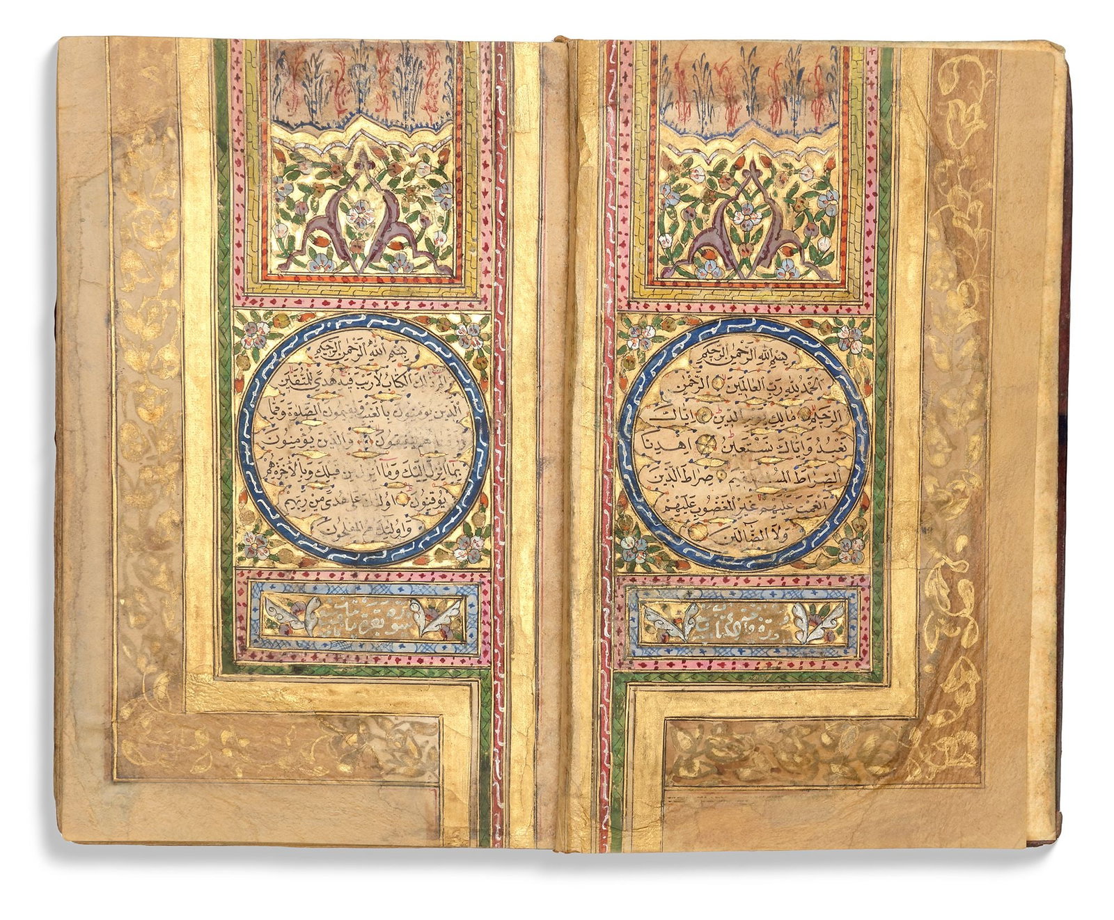 AN ILLUMINATED OTTOMAN QURAN BY HAFIZ AHMED HULUSI, TURKEY, 1284 AH/1867 AD: A complete Quran, Arabic manuscript on cream paper, each page with 15 lines written in black naskh script within gold and black rules, gold roundel verse markers outlined in polychrome dots, catchword