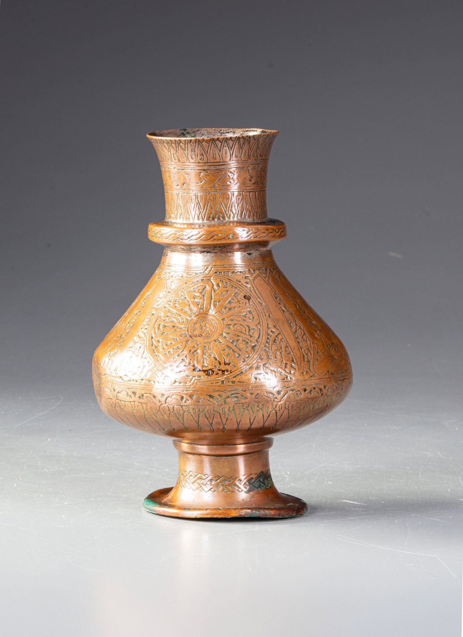 BRASS VASE WITH INSCRIPTION BANDS AND ARABESQUES, MID 14TH CENTURY (1 of 6)