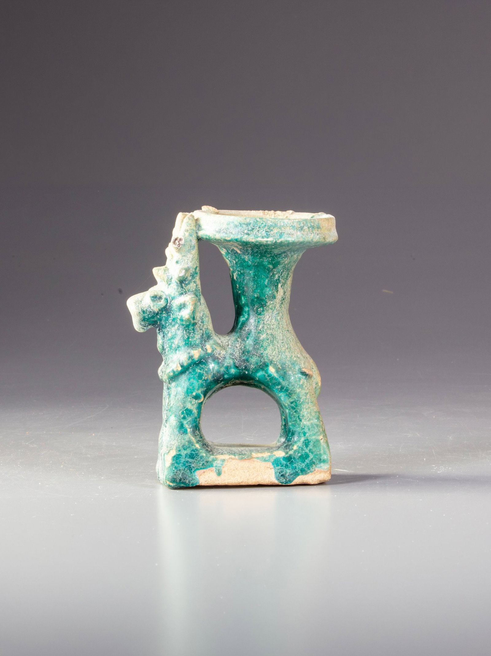A KASHAN TURQUOISE GLAZED POTTERY OIL LAMP , PERSIA , 13TH CENTURY (1 of 3)