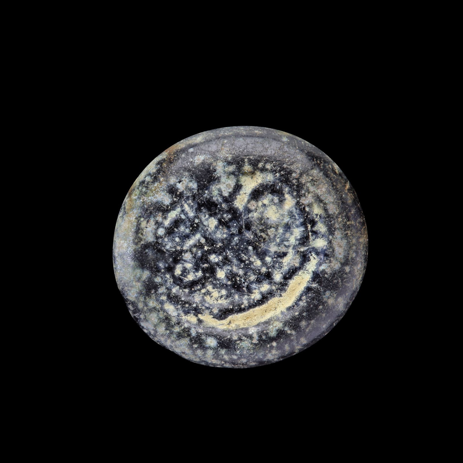 AN EARLY ISLAMIC GLASS WEIGHT OF HALF DINAR (1 of 2)
