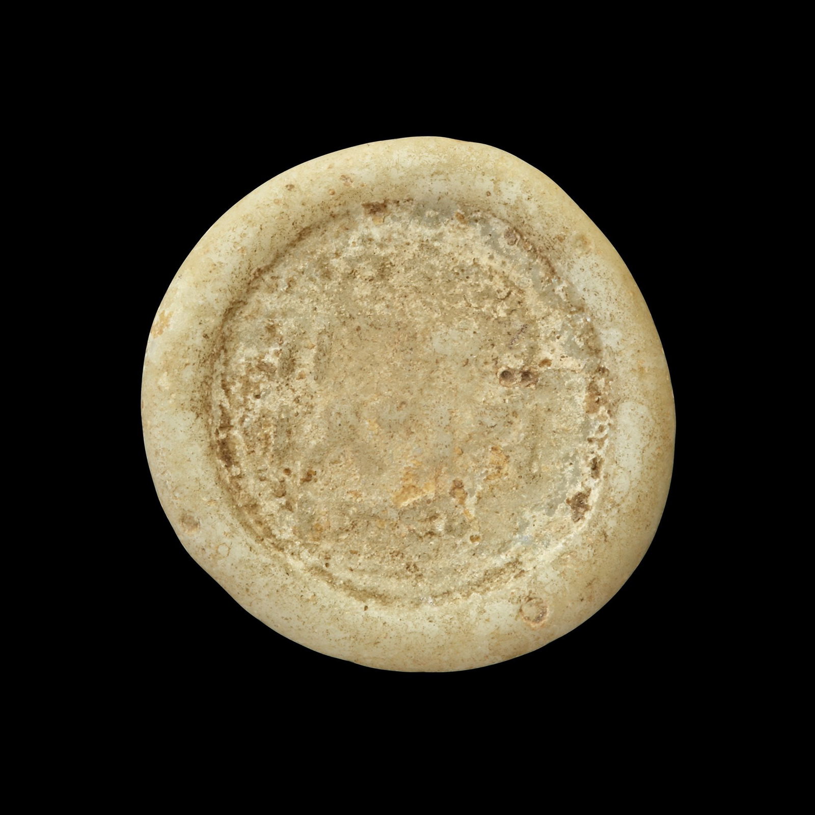 AN ABBASID GLASS WEIGHT OF DIRHAM, BAGHDAD AL-NASIR LI-DIN ALLAH, 576-622 AH/1180-1225 AD (1 of 2)