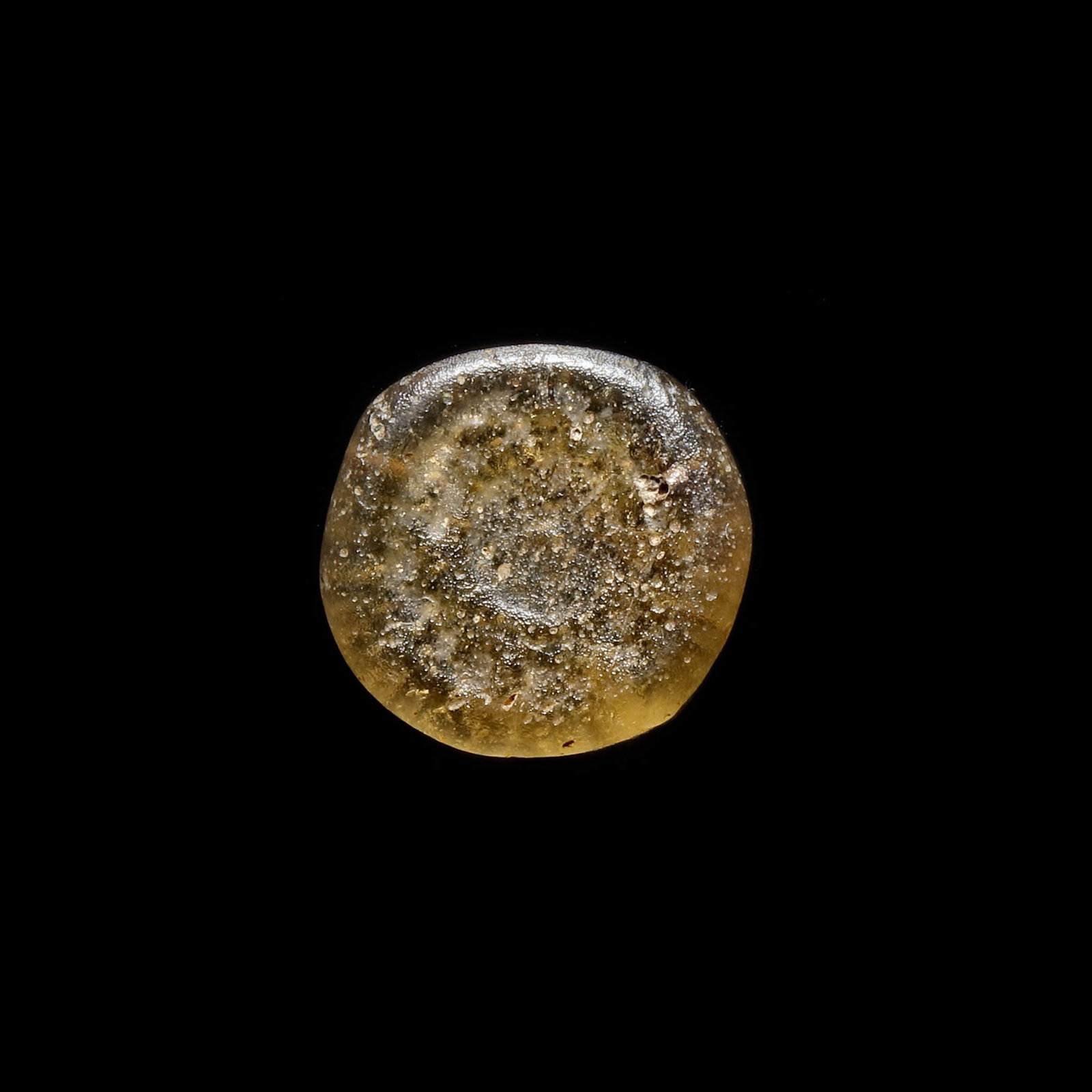 AN EARLY ISLAMIC GLASS WEIGHT OF DIRHAM (1 of 3)