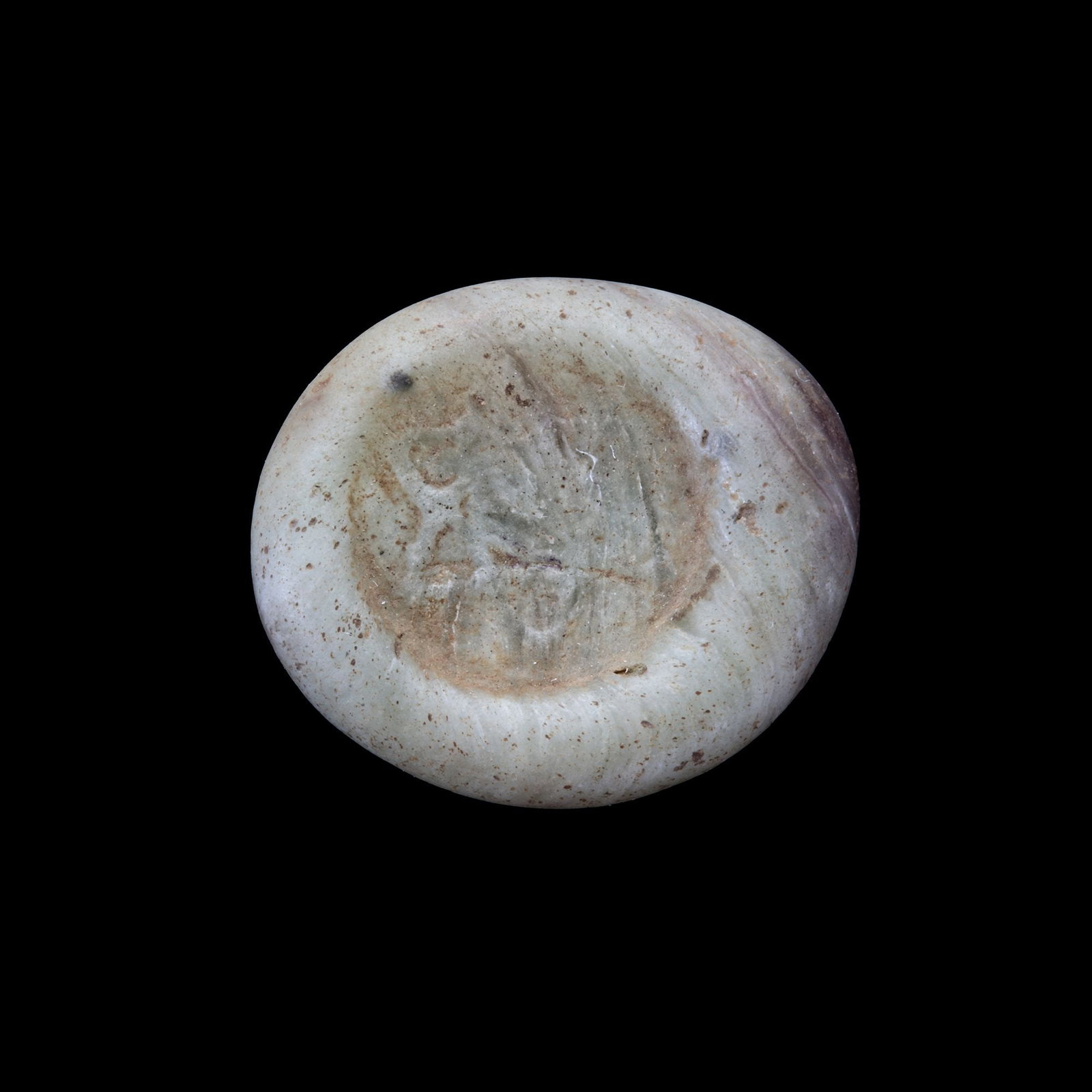 AN EARLY ISLAMIC GLASS WEIGHT OF DOUBLE DIRHAM, 10TH-11TH CENTURY: Glass weight, moulded and stamped, opaque greenish-white in colour with brown splashes, citing in the centre with the star of Solomon, 6.008g, 27.1 mm, coin weight: double dirham.