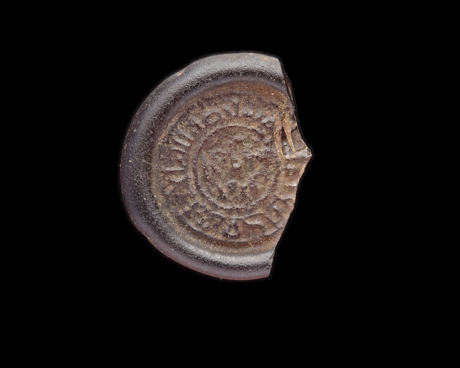 AN EARLY ISLAMIC GLASS WEIGHT OF DIRHAM (1 of 2)
