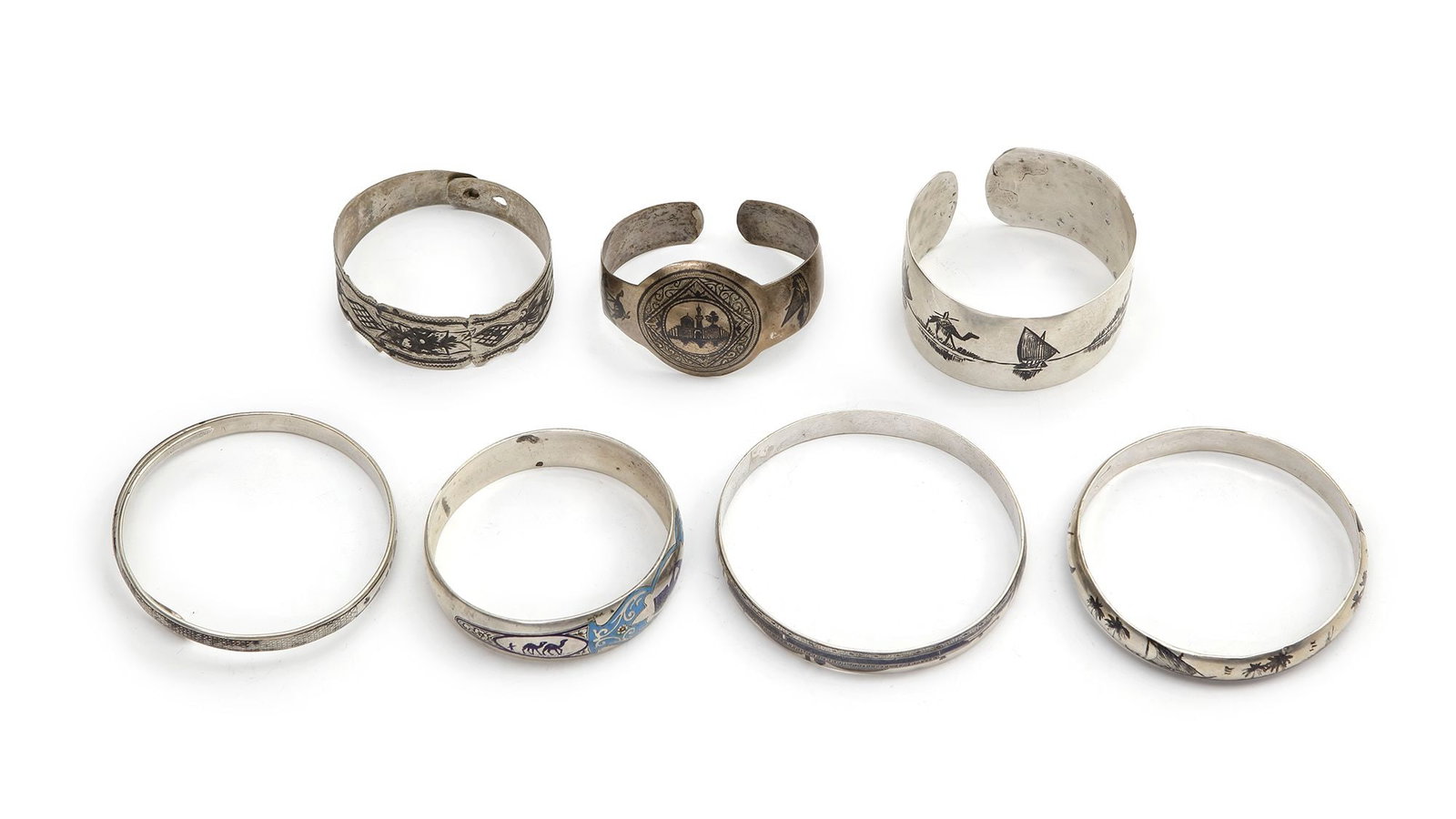 SEVEN SILVER BRACELETS, IRAQ, EARLY 20TH CENTURY (1 of 2)