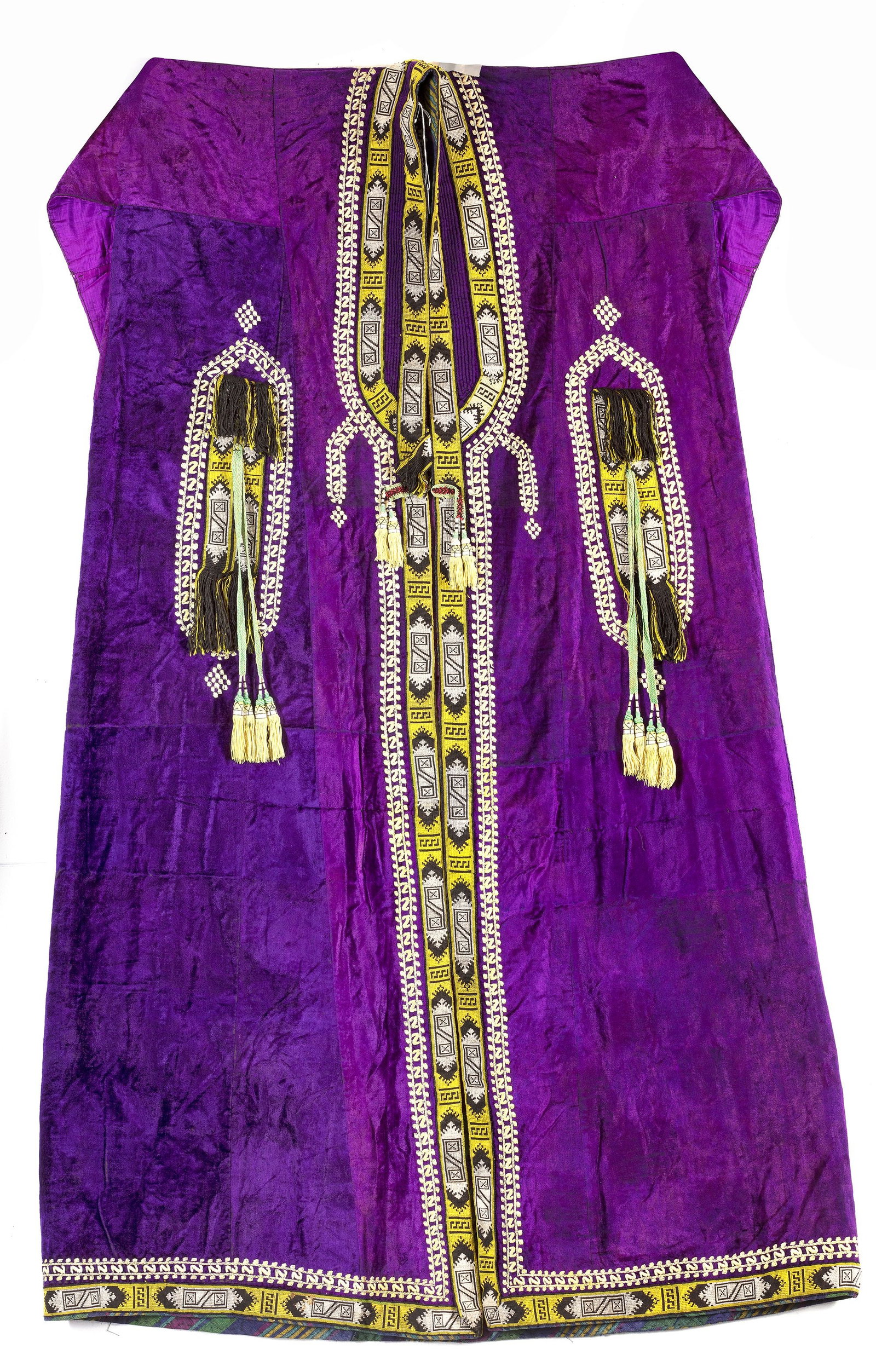 A WOMAN'S PARANJA, UZBEKISTAN, 20TH CENTURY: The paranja was a cape-like garment with long false sleeves that were fastened together and hung down the length of the back. Draped over a womanâ€™s head, it was designed to envelop her compl