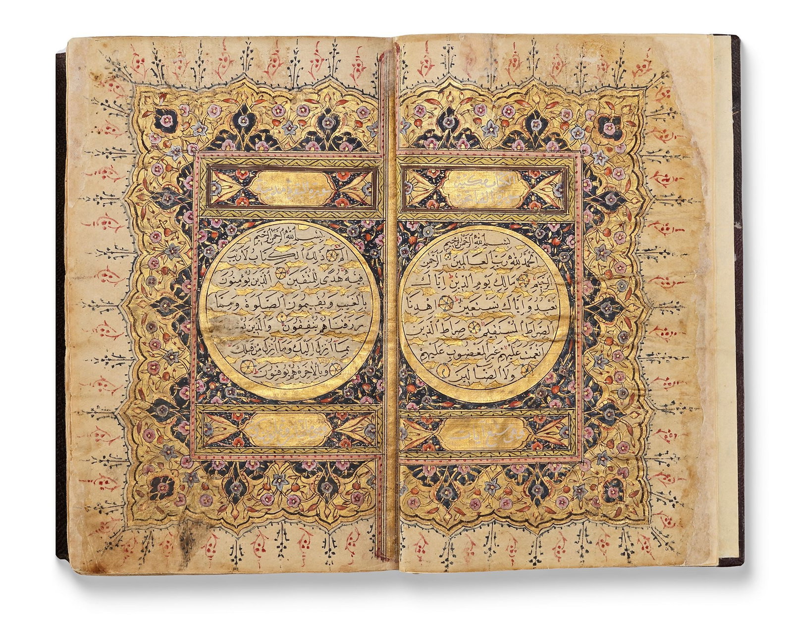 AN ILLUMINATED OTTOMAN QURAN, WRITTEN BY THE SCRIBE AHMED HELMI, STUDENT OF ASAYLI AL-MASRI, DATED: Arabic manuscript on paper, 363 leaves, each folio with 15 lines of elegant black naskh script, diacritics and vowels in red, gold roundel verse markers outlined in black with polychrome dots, large g
