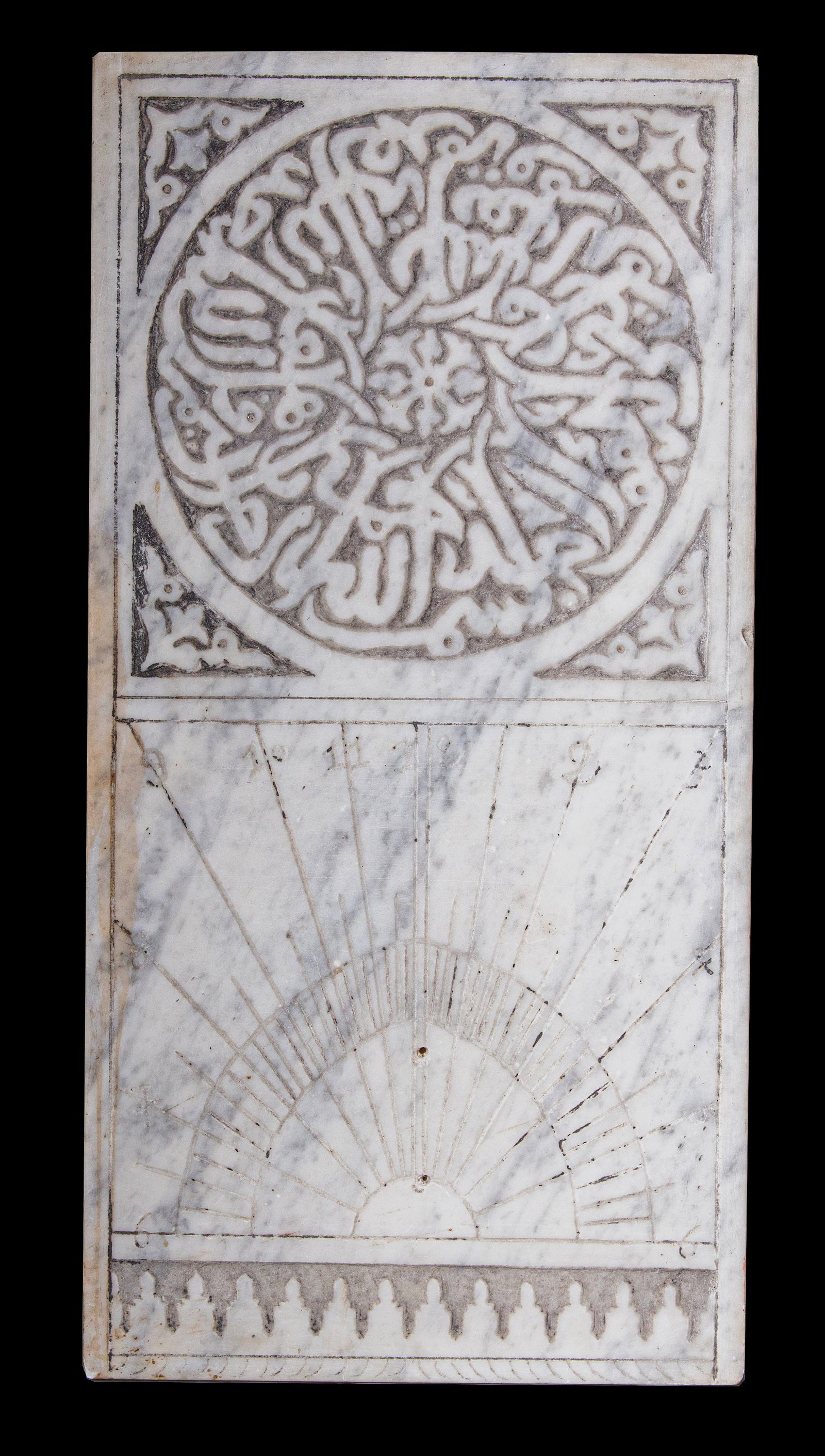 AN ISLAMIC MARBLE SUNDIAL,19TH CENTURY: A finely carved crystalline marble sundial , used to measure time by the sunâ€™s shadow and to determine prayer times, 60 by 30 cm.