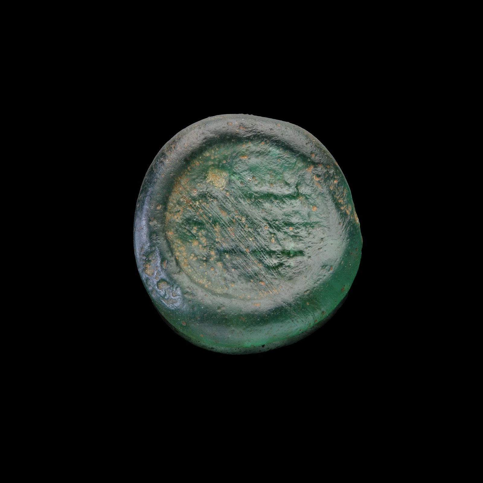 AN EARLY ISLAMIC GLASS WEIGHT OF DOUBLE DIRHAM (1 of 2)