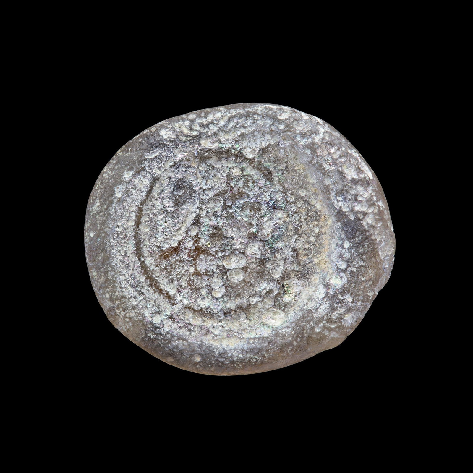 AN EARLY ISLAMIC GLASS WEIGHT OF HALF DINAR (1 of 2)