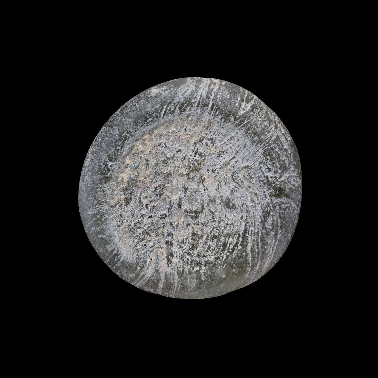 AN EARLY ISLAMIC GLASS WEIGHT OF DOUBLE DIRHAM, 10TH-11TH CENTURY: Glass weight, moulded and stamped, transparent light-green in colour, citing in the centre with 2 lines of undeciphered Arabic text. 5.665 g., 24 mm. coin weight: double dirham.