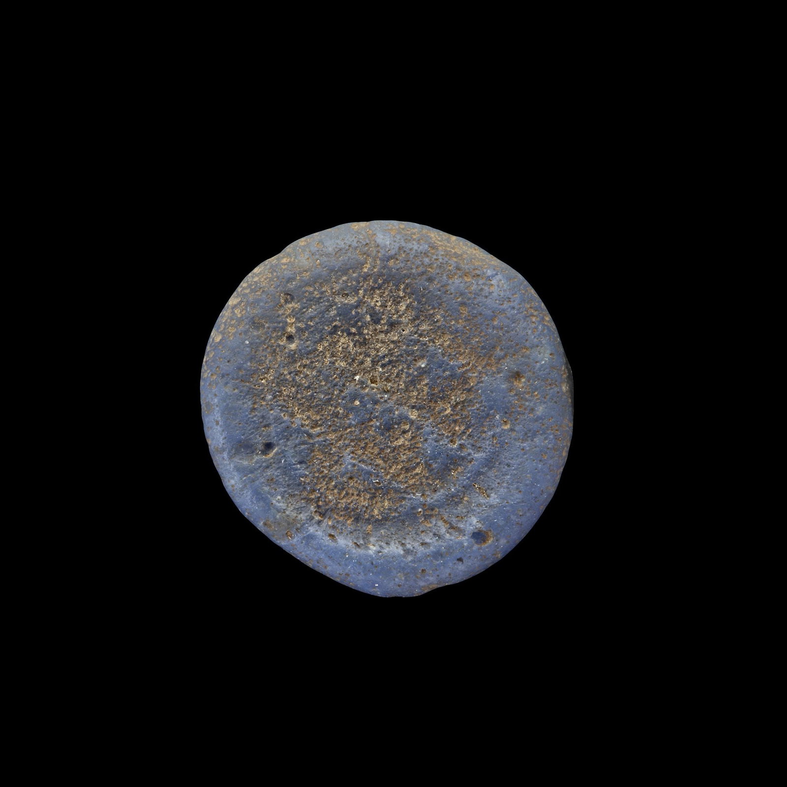 AN EARLY ISLAMIC GLASS WEIGHT OF DIRHAM,10TH-11TH CENTURY: Glass weight, moulded and stamped, opaque dark-blue in colour, citing in the centre with 3 lines of undeciphered Arabic text. 2.671 g., 18 mm. coin weight: dirham.