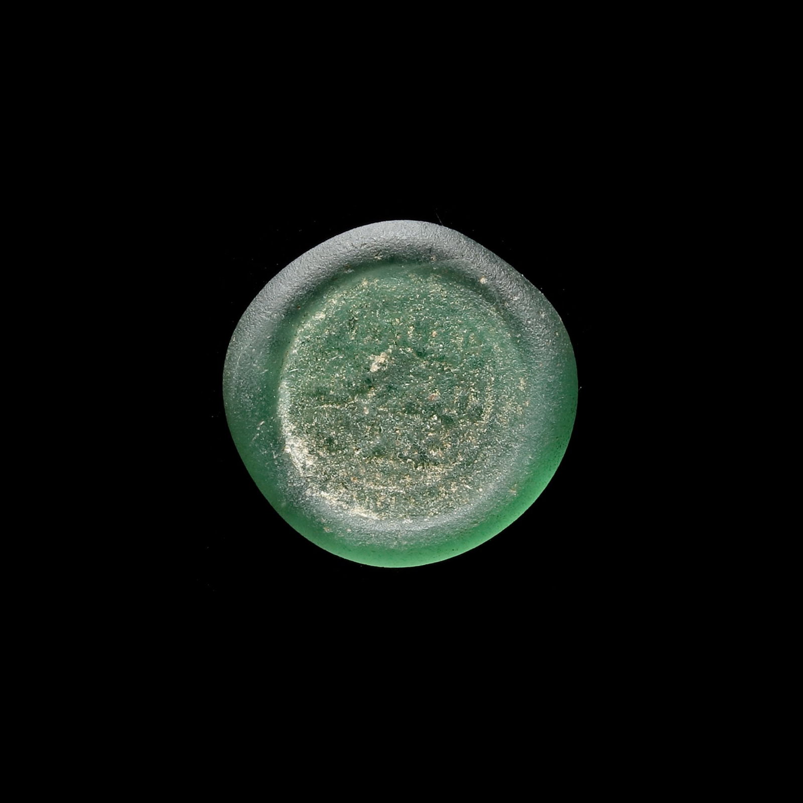 AN EARLY ISLAMIC GLASS WEIGHT OF DIRHAM (1 of 3)