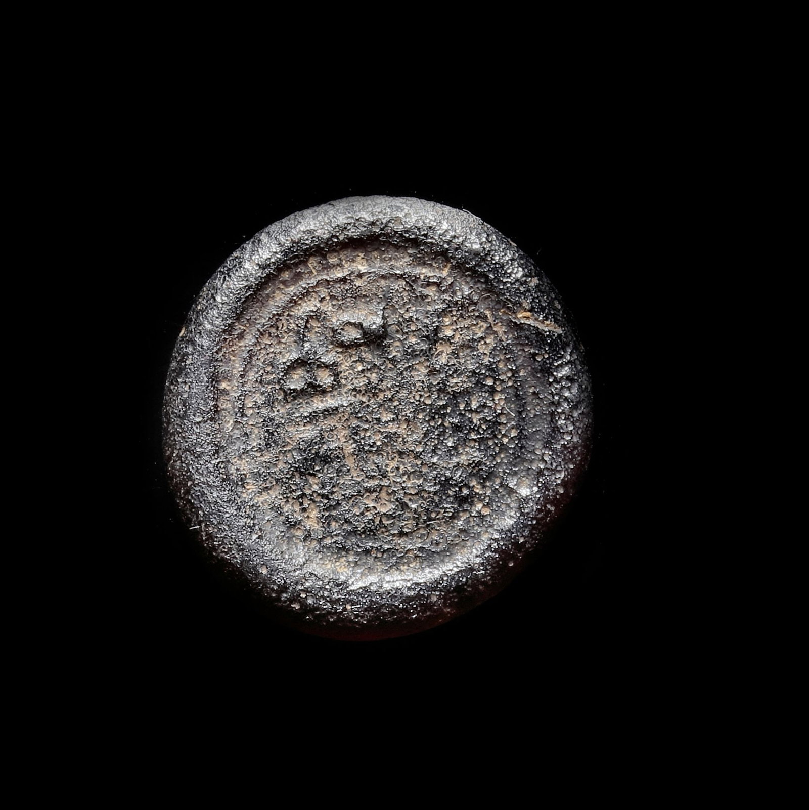AN EARLY ISLAMIC GLASS WEIGHT OF DIRHAM (1 of 3)