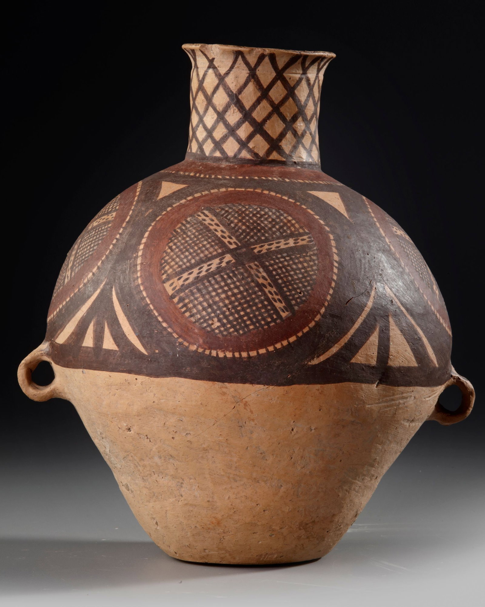 A NEOLITHIC PAINTED POTTERY JAR, MAJIAYAO CULTURE, CHINA, MID TO LATE 3RD MILLENIUM BC: Height ca. 27 cm. Provenance: Private collection, The Netherlands.