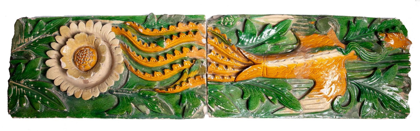 A SET OF TWO GREEN AND AMBER GLAZED ARCHITECTURAL TILES, CHINA, MING DYNASTY (1368-1644) (1 of 2)