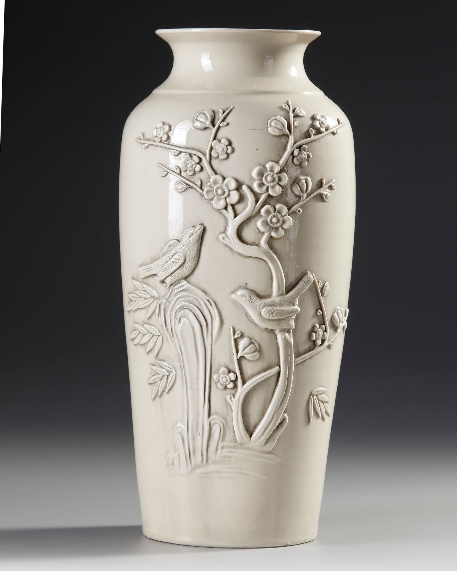 A CHINESE DEHUA BLANC DE CHINE ROULEAU VASE,QING DYNASTY (1644â€“1911) (1 of 2)