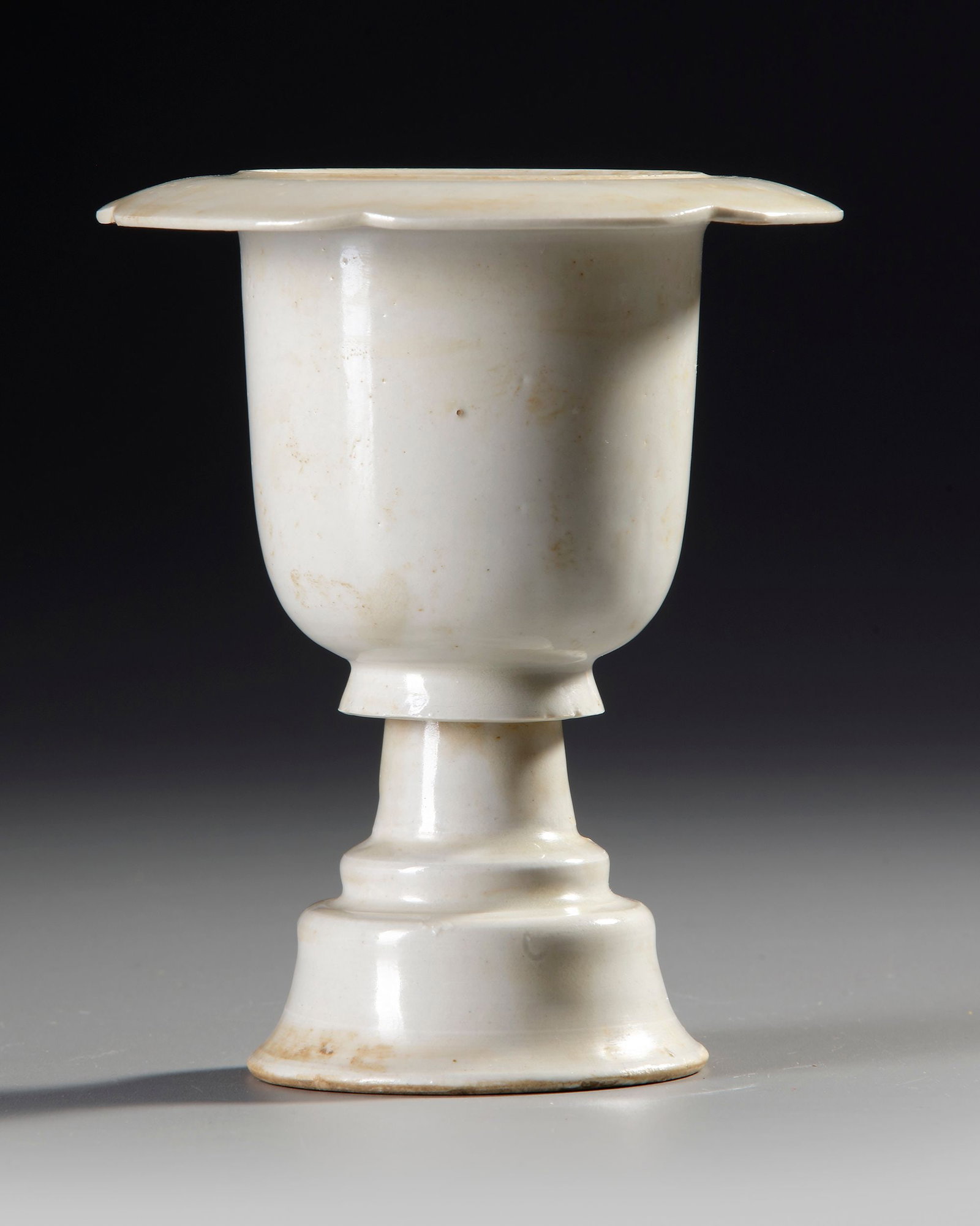 A CHINESE WHITE-GLAZED CERAMIC STEM CUP,SONG DYNASTY (960-1279) (1 of 4)