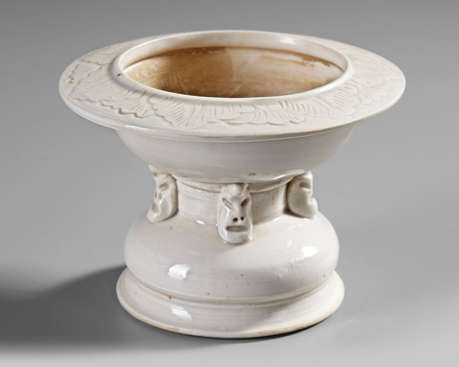 A CHINESE WHITE-GLAZED ALTAR STAND OR INCENSE HOLDER,SONG DYNASTY (960-1279) (1 of 4)