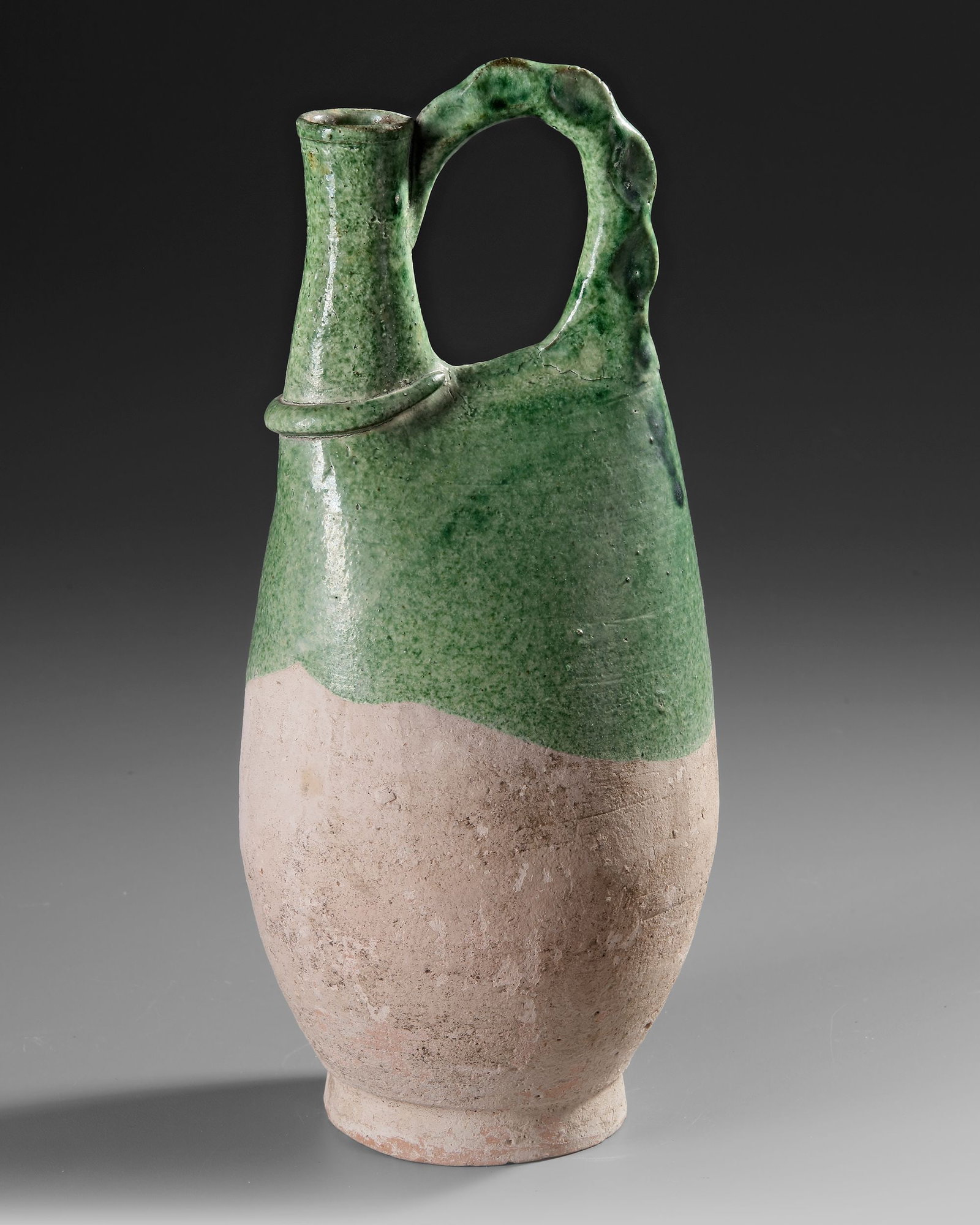 A CHINESE GREEN-GLAZED POTTERY FLASK, LIAO DYNASTY (AD 907-1125) (1 of 4)