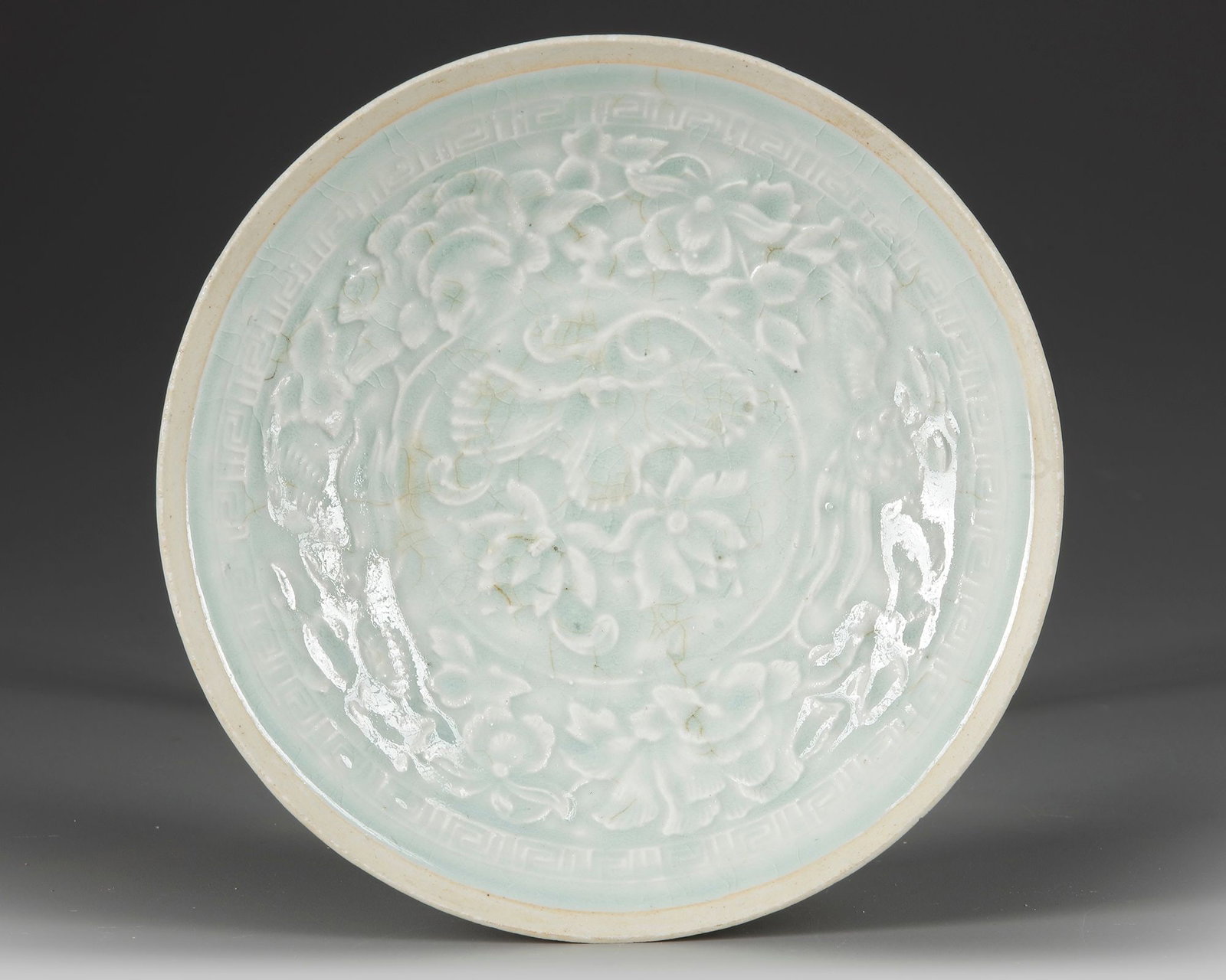 A CHINESE QINGBAI 'FLORAL' BOWL, SONG DYNASTY (960-1279) (1 of 3)