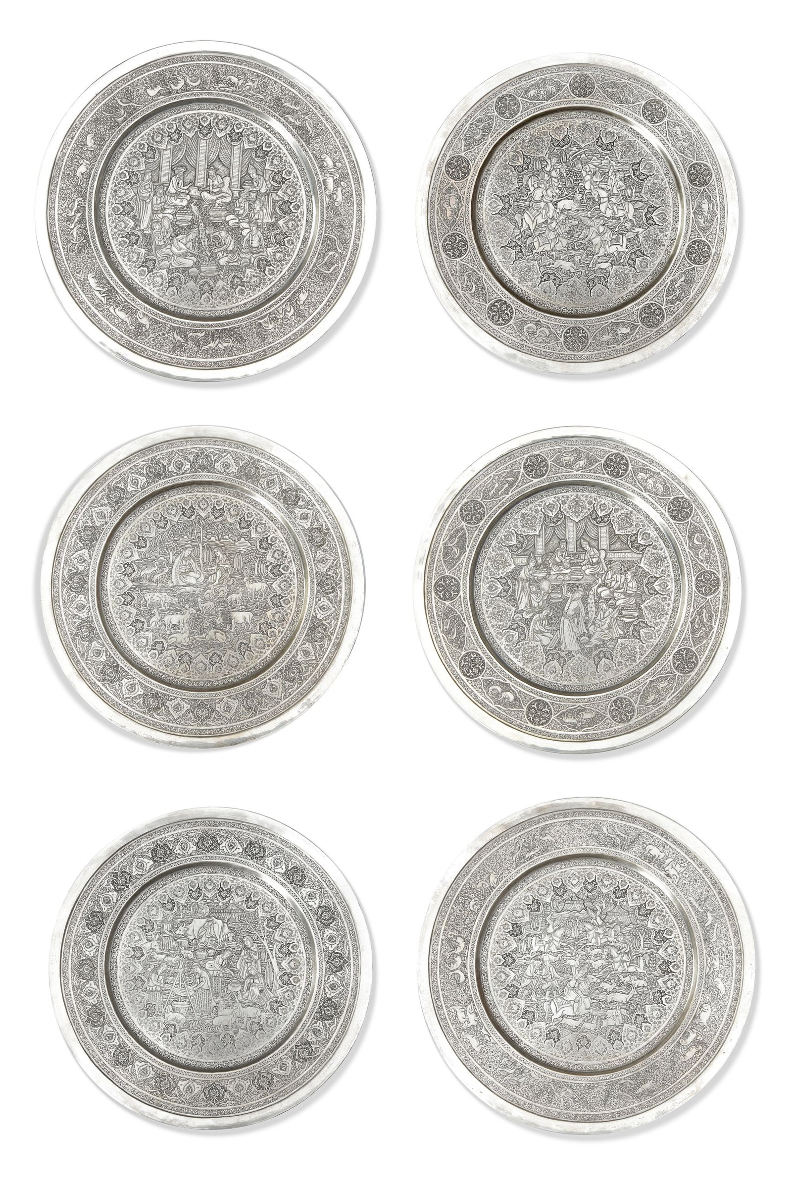 SIX PERSIAN SILVER PLATES SIGNED BY LAHIJI, CIRCA 1900: This magnificent set of six engraved Persian silver plates represents one of the finest examples of Isfahan metalwork from the late 19th to early 20th century. Each plate is exquisitely decorated with