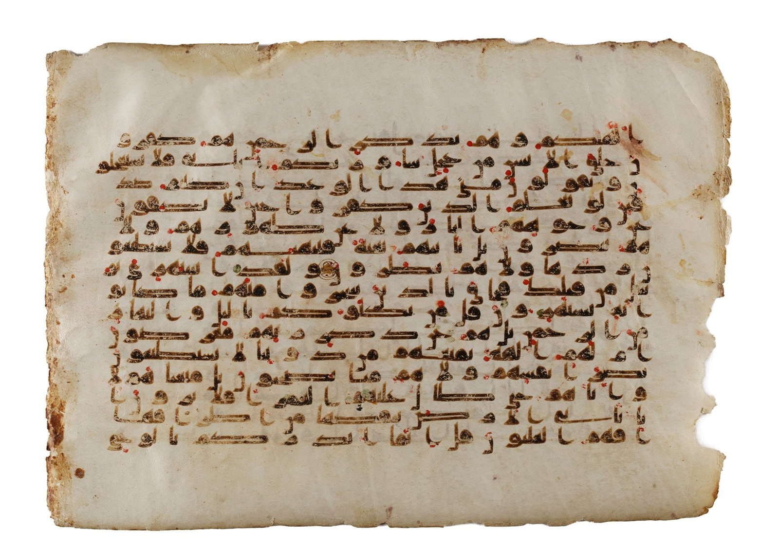 A QURAN FOLIO IN KUFIC SCRIPT ON VELLUM, NEAR EAST OR NORTH AFRICA 9TH CENTURY (1 of 2)