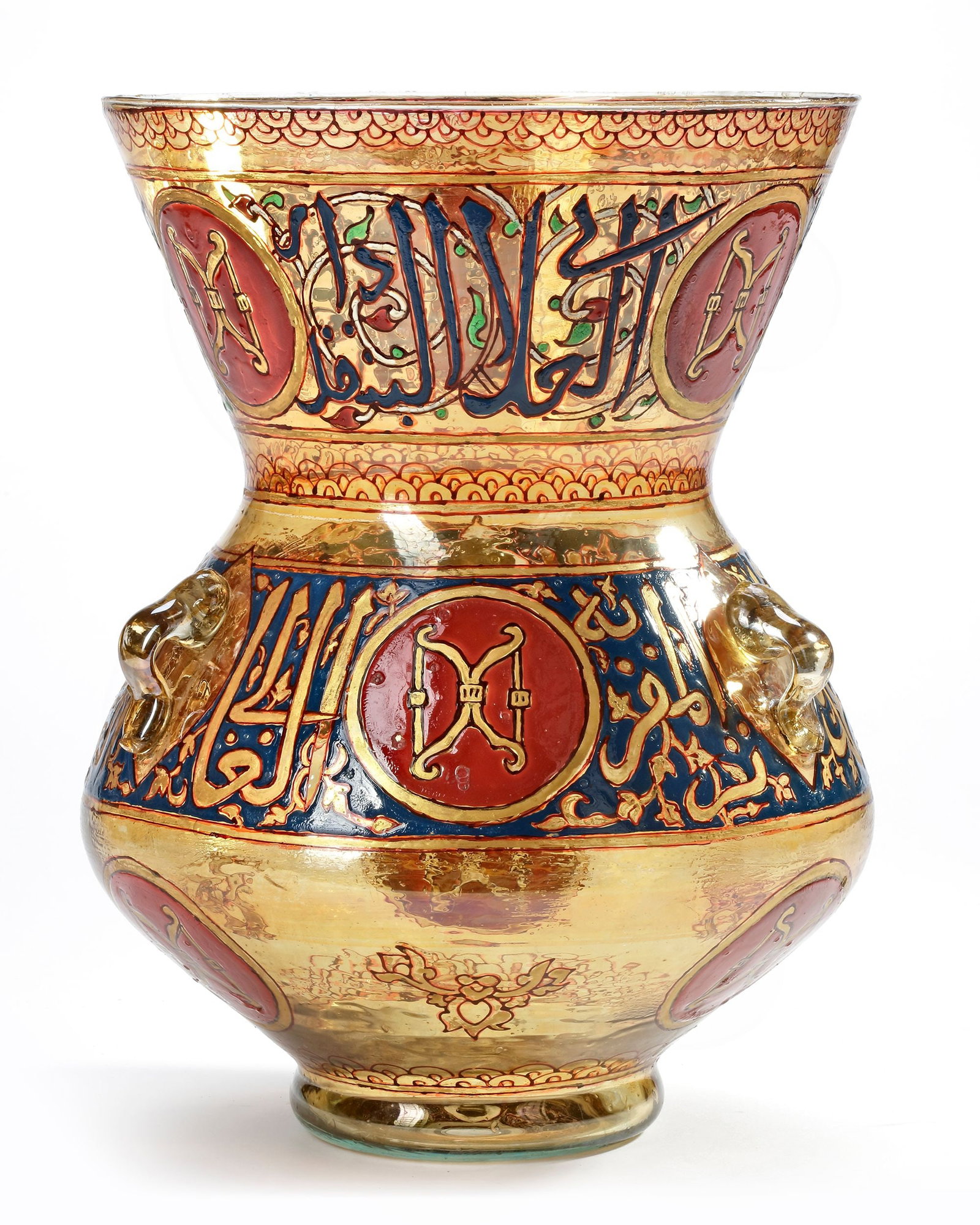 A LARGE ISLAMIC GILT AND ENAMELED GLASS MOSQUE LAMP, 19TH CENTURY: A large glass gilt and enameled mosque lamp, of typical form, set on a short foot with six loop handles around the shoulder. The rounded, angular body features a flaring conical mouth, decorated in po