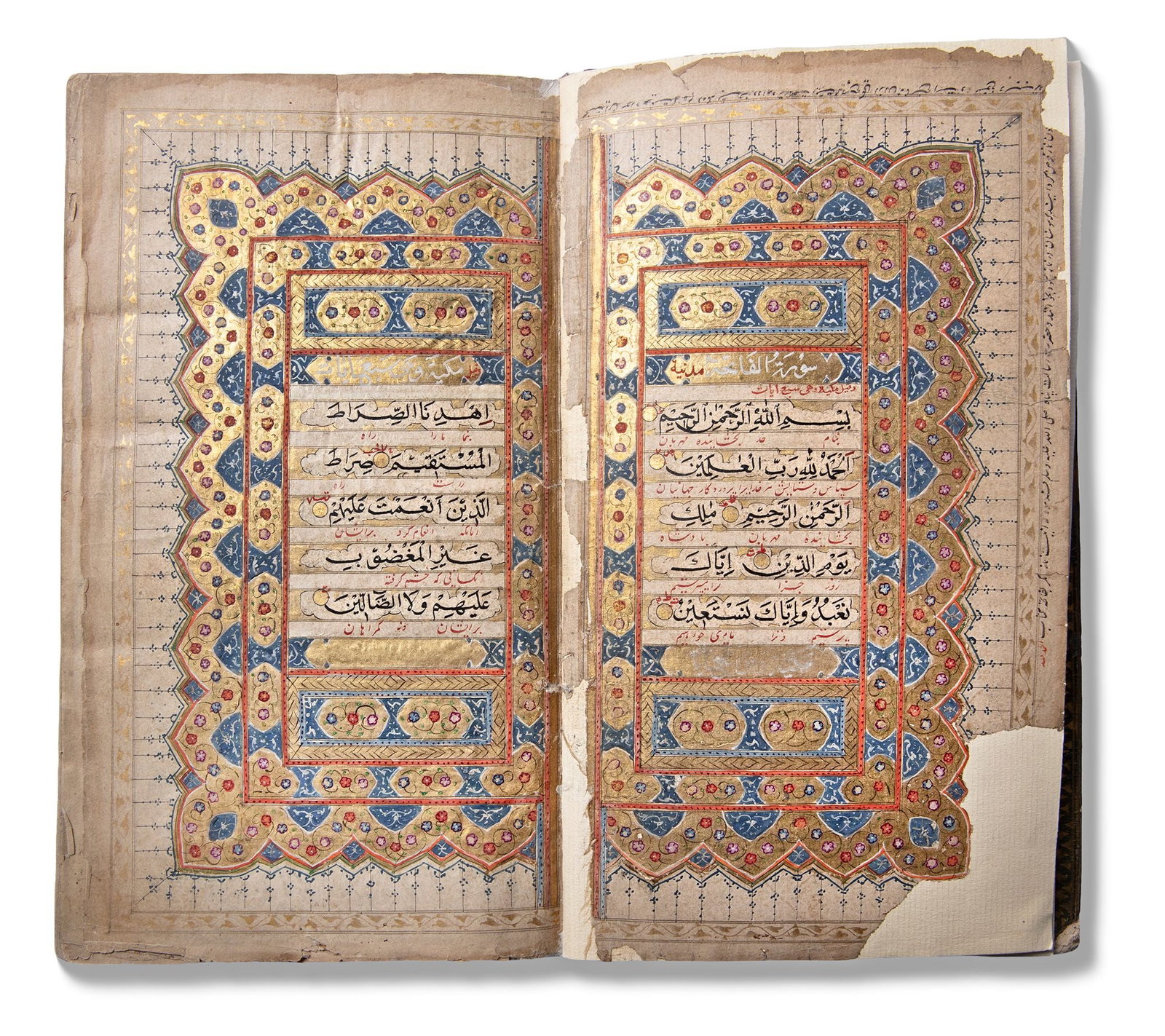 AN ILLUMINATED QAJAR QURAN, PERSIA 19TH CENTURY: A complete Quran, Arabic manuscript on paper, comprising 413 folios. Each folio with 13 lines of elegant black Naskh script, with an interlinear Persian translation in red. Gold and polychrome rosette