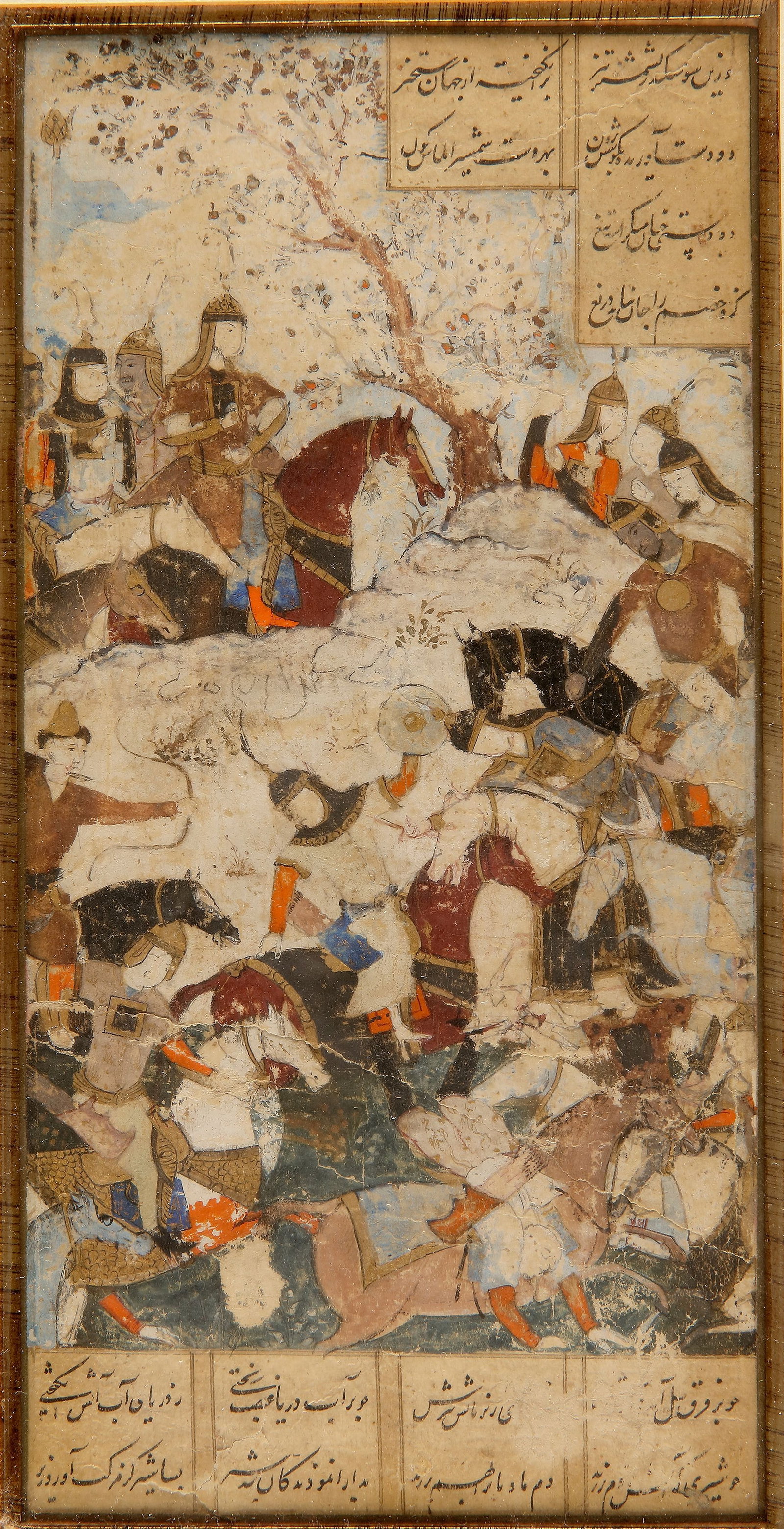 A BATTLE SCENE, PERSIA SAFAVID, 16TH CENTURY: Persian manuscript, with opaque watercolour, ink, and gold on paper. A dynamic cavalry battle unfolds beneath a flowering tree, where armoured horsemen clash in close combat with swords and maces. The