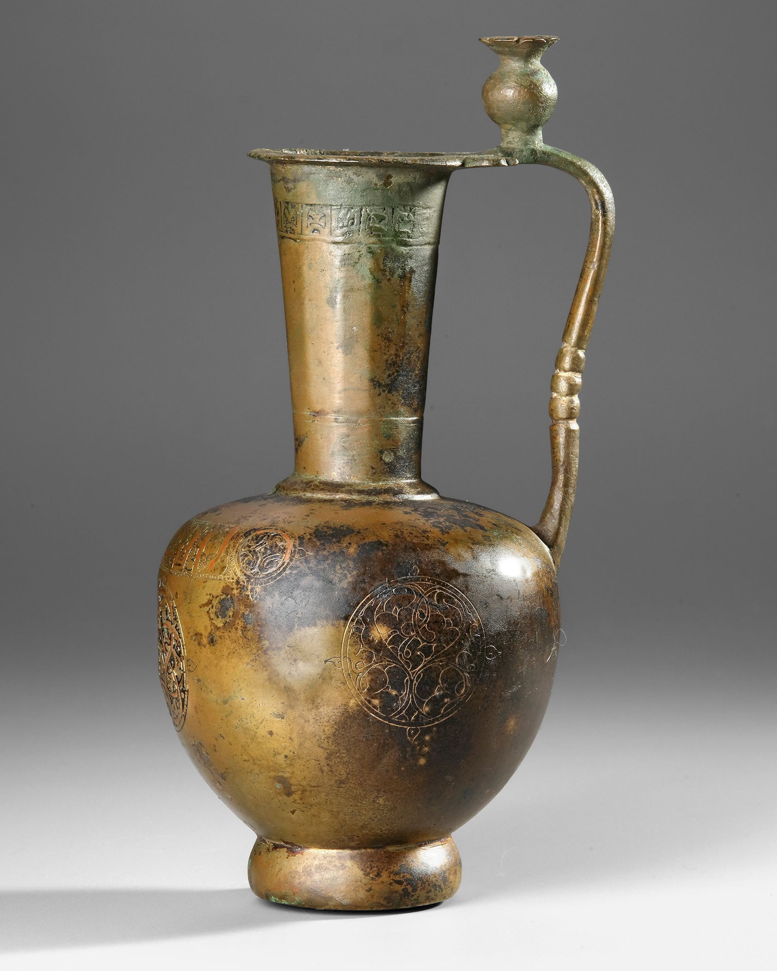 A KHORASAN BRONZE EWER, NORTH EAST PERSIA, 12TH CENTURY (1 of 5)