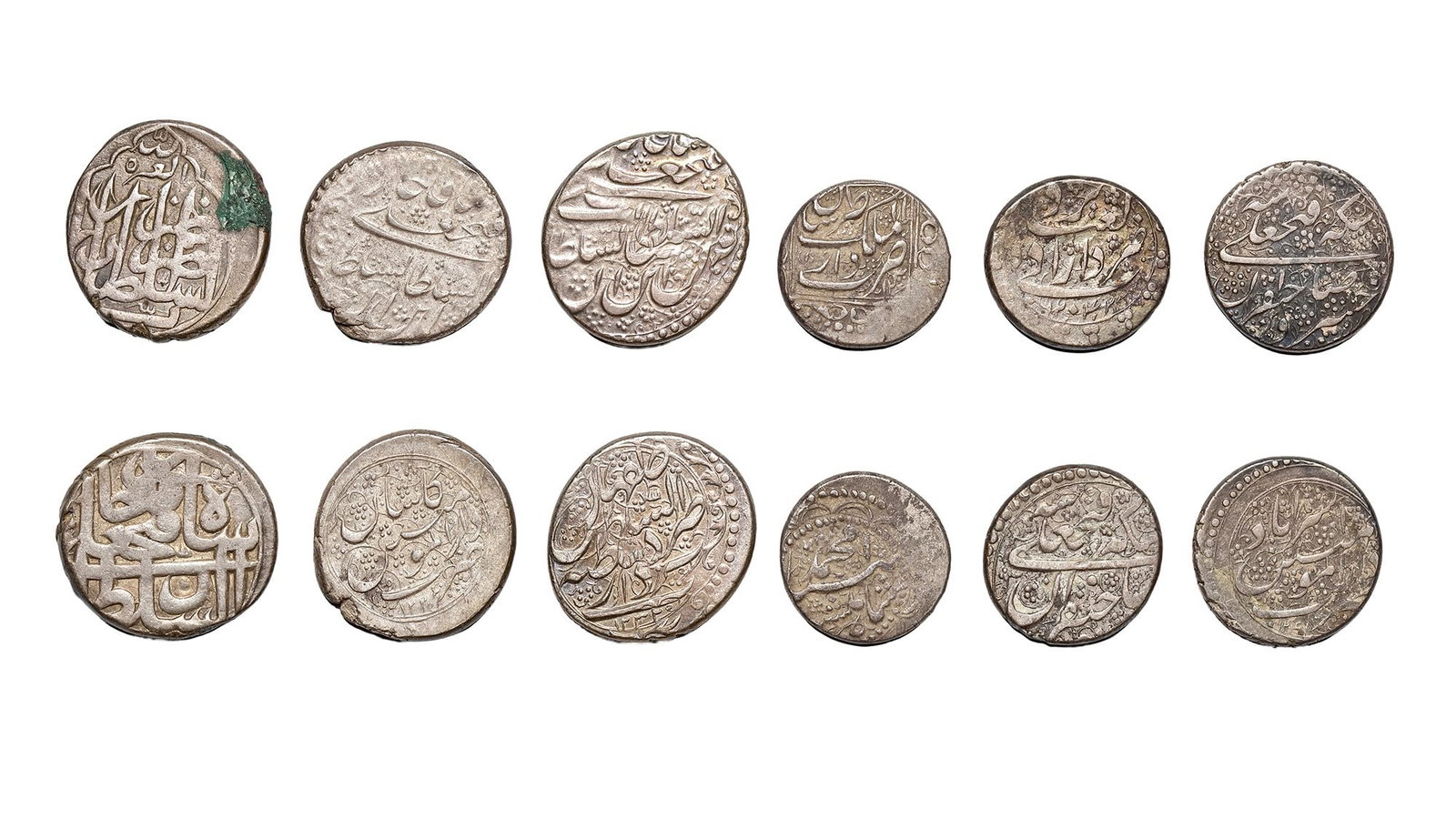 QAJAR, TEMP. FATH ALI SHAH (1212â€“1250AH/1797â€“1834AD), SIX SILVER COINS, DATED: A silver riyal, Tehran mint, dof,10.3g, 23mm. A silver riyal, Kashan mint, dated 1226AH/ 1811AD, 10.3g, 21mm. A silver riyal, Isfahan mint, dated 1232AH/1817AD, 9.2g, 23mm. A silver riyal, Tehran mint