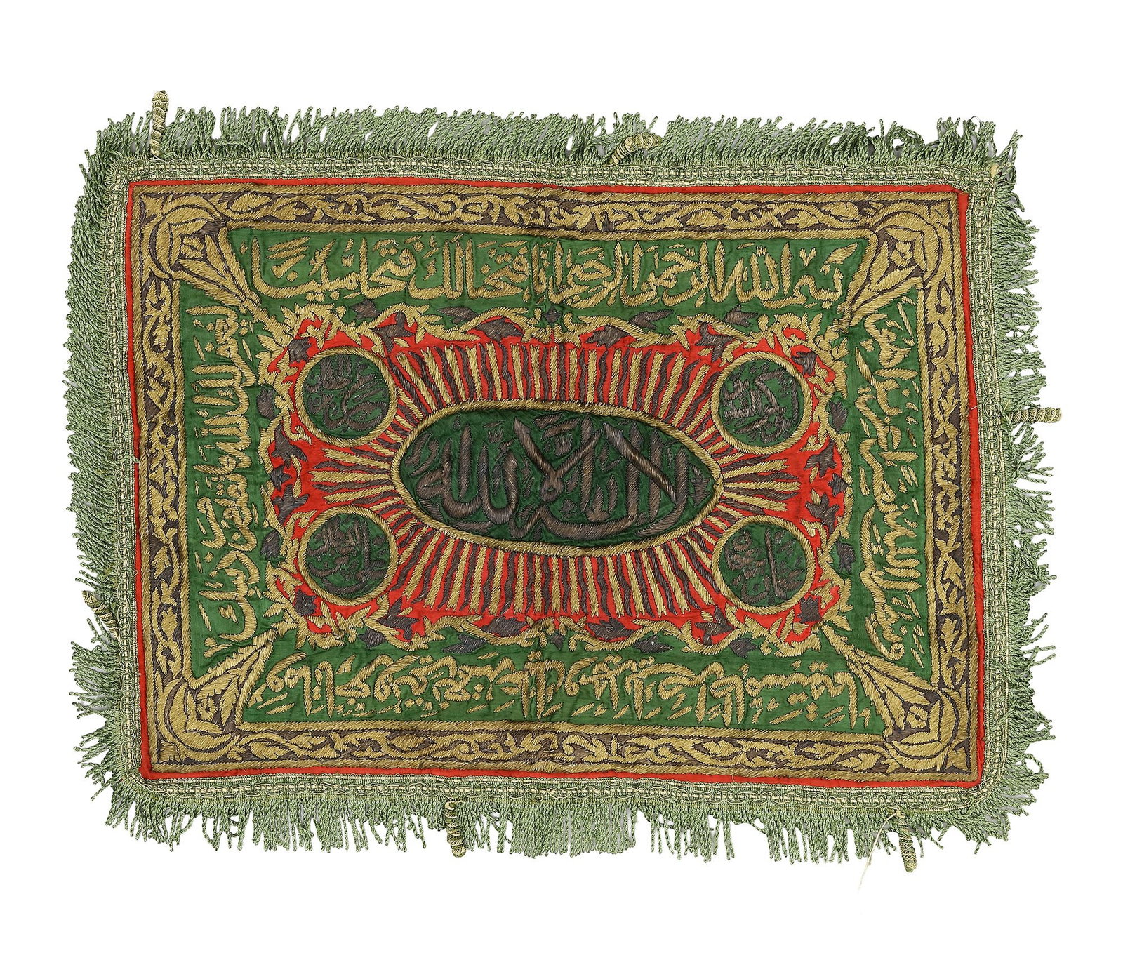 AN OTTOMAN GILT AND SILVER EMBROIDERED CALLIGRAPHIC PANEL, EARLY 20TH CENTURY: Rectangular devotional textile panel embroidered in gilt and silver metallic threads on a green ground, enclosed within multiple ornamental borders. The central oval medallion contains the Kalimat al-