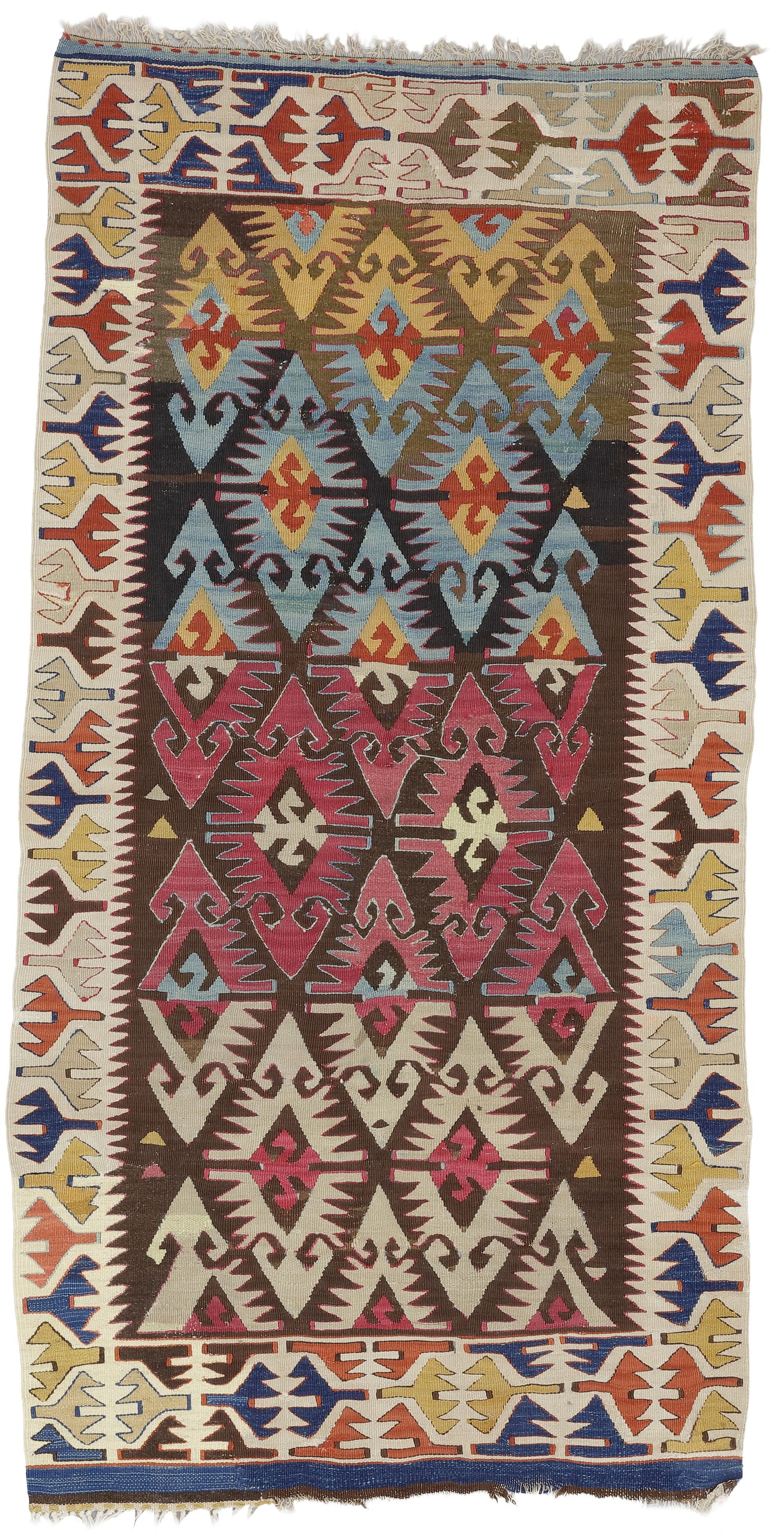 AN ANTIQUE SMALL CENTRAL ANATOLIAN KILIM: Up for auction is a charming and color-rich antiquity of Anatolian flatweave art: An antique Central Anatolian kilim in a highly sought-after small format, hand-woven around 1900. Despite its compact 