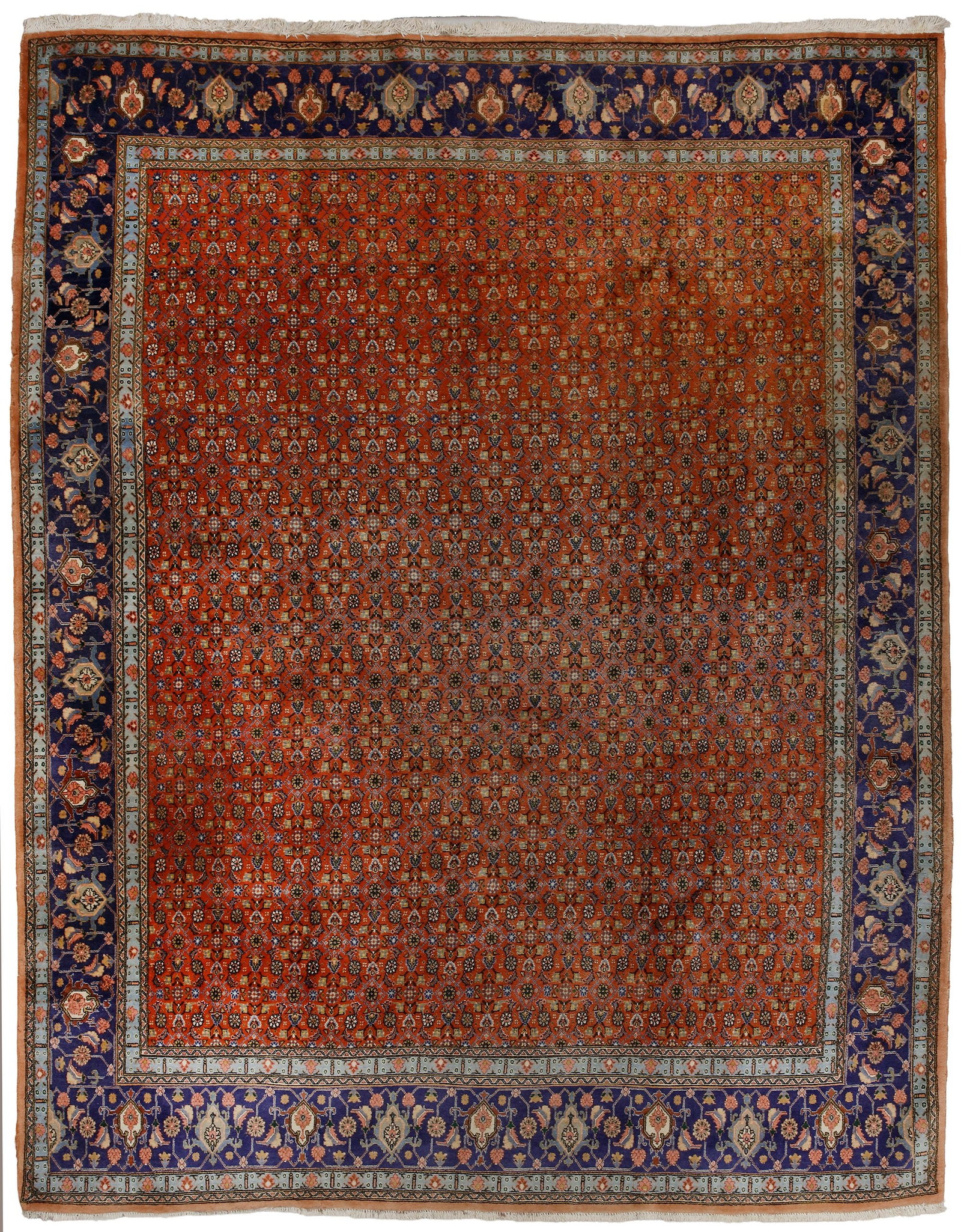 SEMI-ANTIQUE BIJAR ORIENTAL RUG â€?? PERSIA, CIRCA 1950: Up for auction is a prestigious and vibrantly colored Persian Oriental rug from the renowned weaving tradition of Bijar. This is a hand-knotted, semi-antique specimen crafted around 1900. The highly e