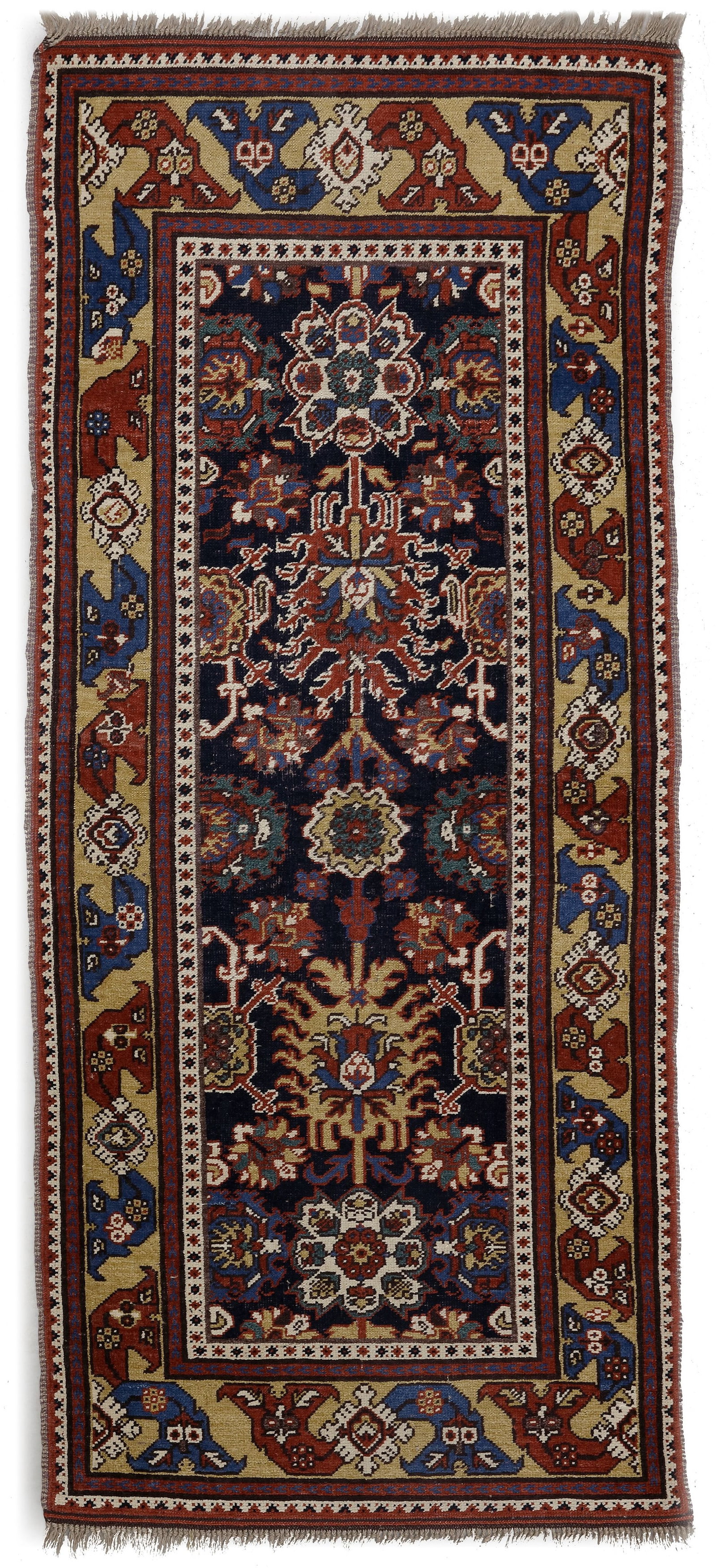AN ANTIQUE CAUCASIAN RUG RUNNER (1 of 2)