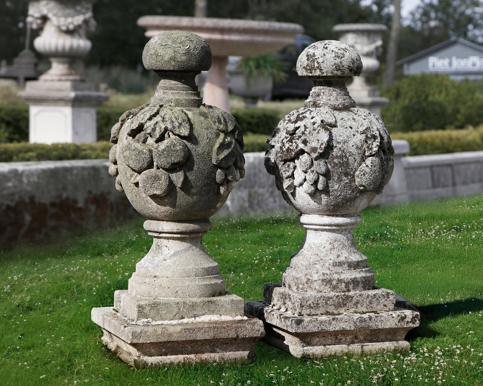 A PAIR CARVED LIMESTONE FINIALS, LATE 19TH CENTURY: Height 65 cm. Width 31 cm. Depth 27 cm.