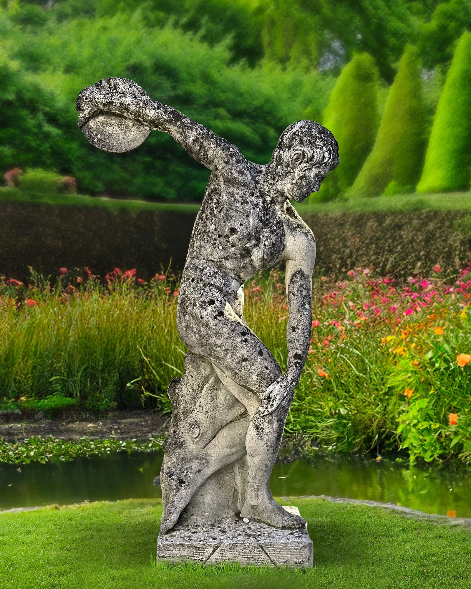 A COMPOSITION STONE FIGURE OF A DISCOBOLO, 20TH CENTURY: Height 170 cm.