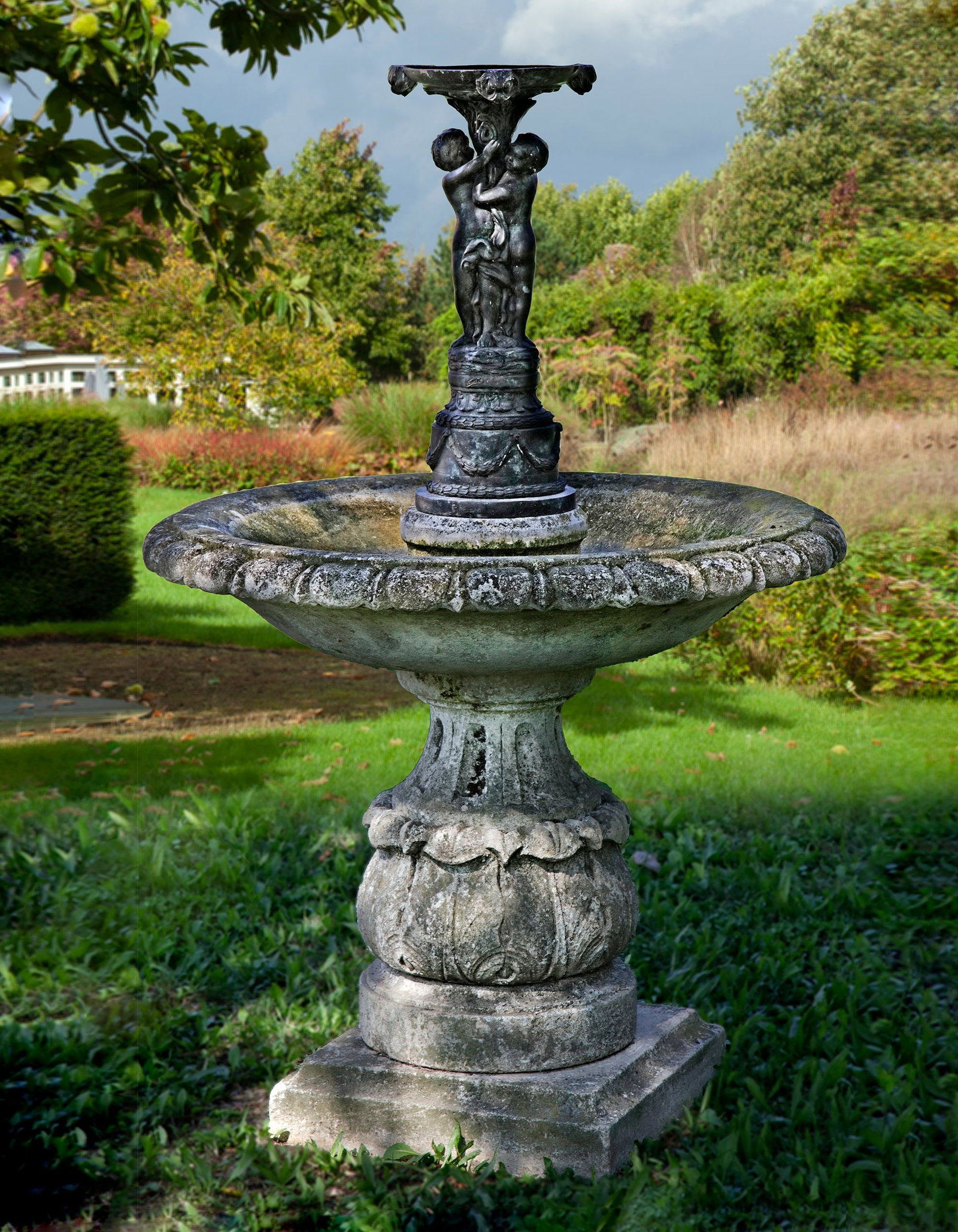 A CARVED LIMESTONE AND BRONZE MOUNTED FOUNTAIN, FIRST QUARTER 20TH CENTURY AND LATER (1 of 1)