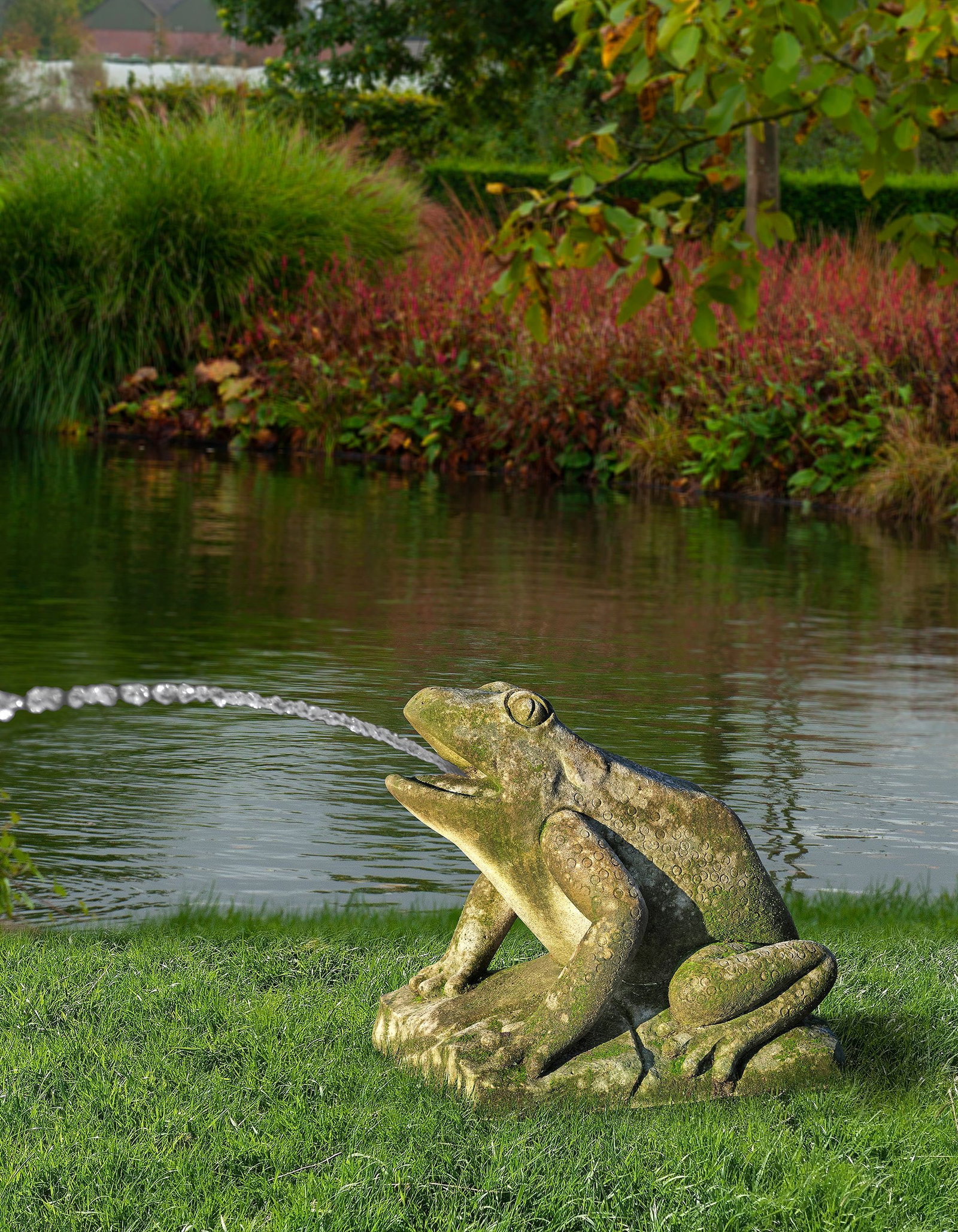 AN ITALIAN SCULPTED LIMESTONE MODEL OF A FROG (1 of 1)